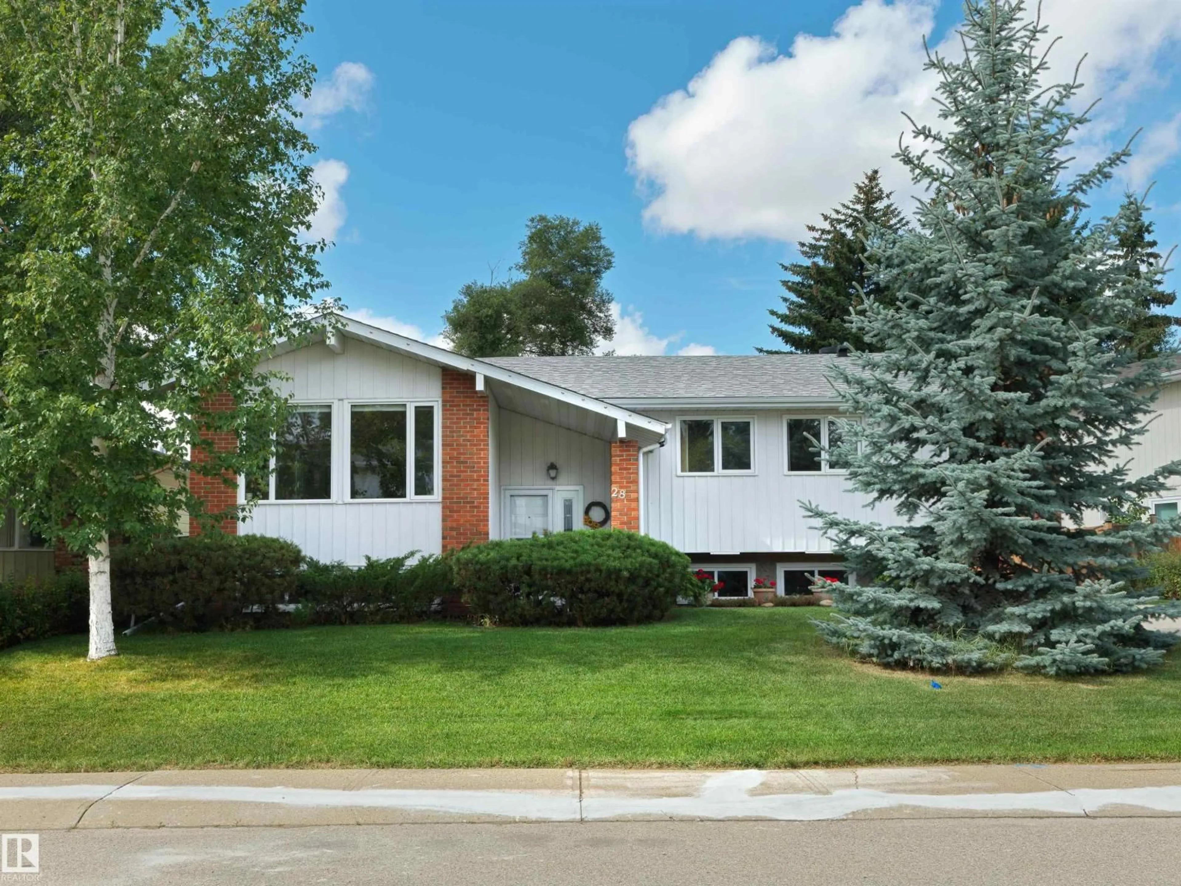 Home with vinyl exterior material, street for 28 WESTRIDGE CR, Edmonton Alberta T5T1C6