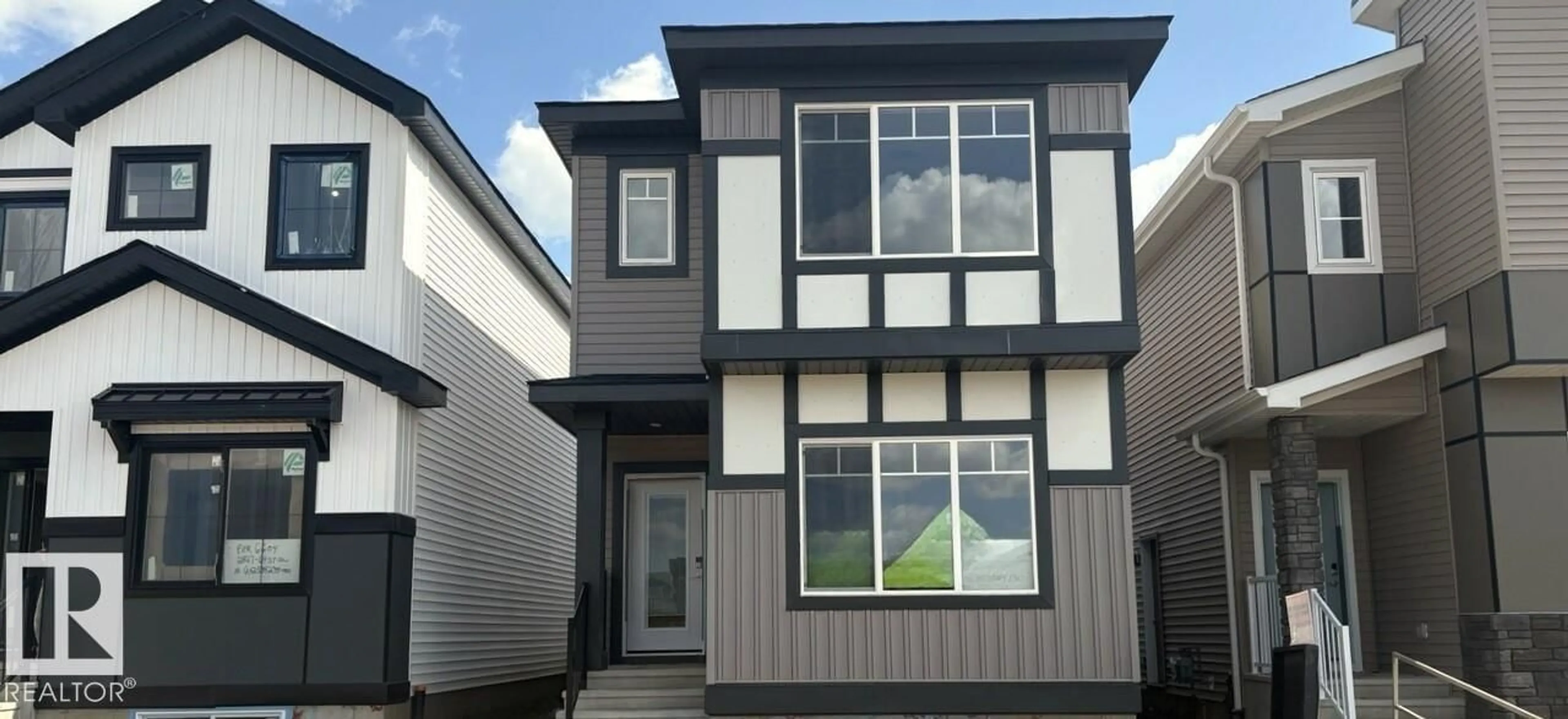 Home with vinyl exterior material, street for SW - 2831 64 ST, Edmonton Alberta T6X3M8