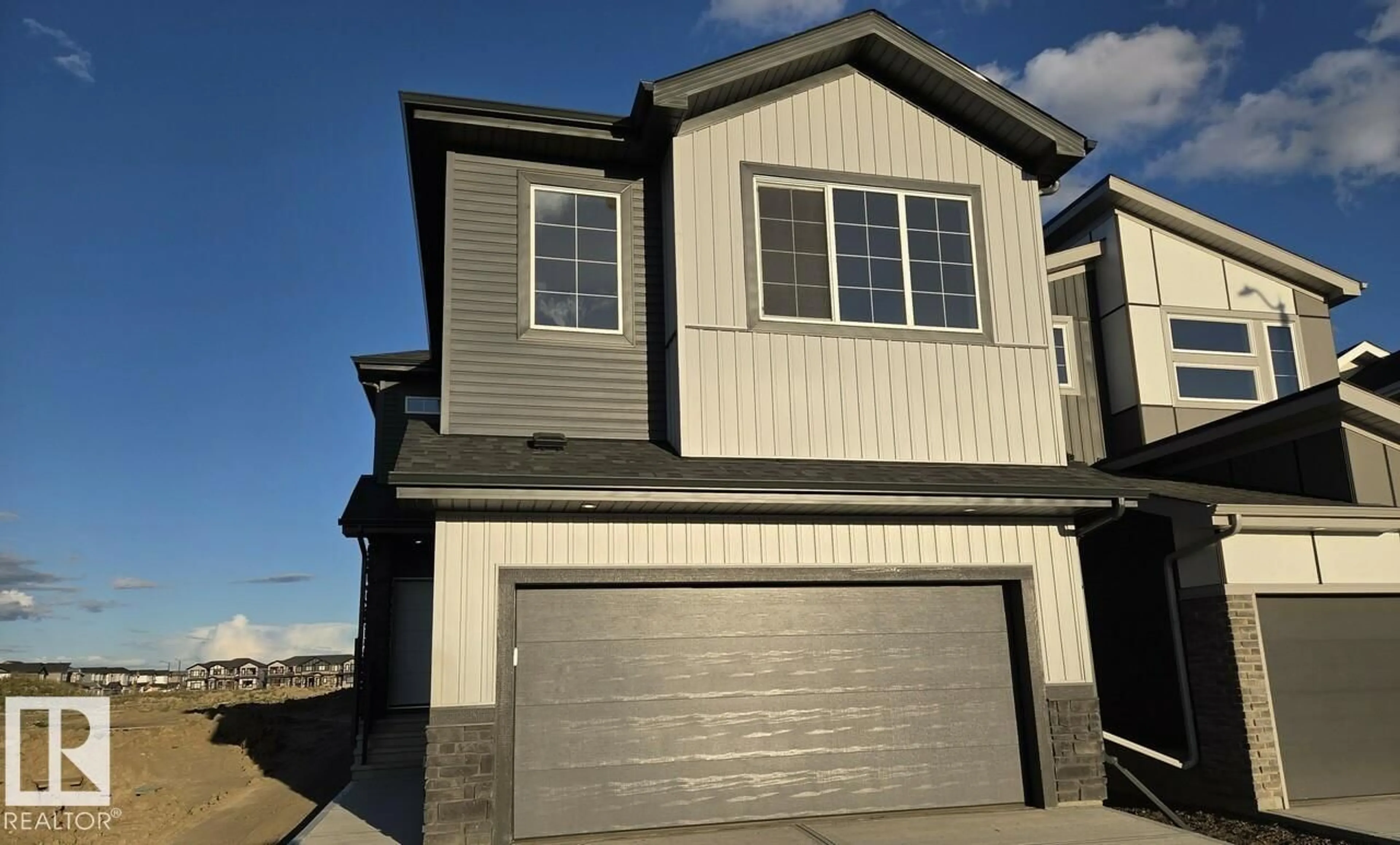 Home with vinyl exterior material, street for 339 LINDEN LO, Leduc Alberta T9E8S8