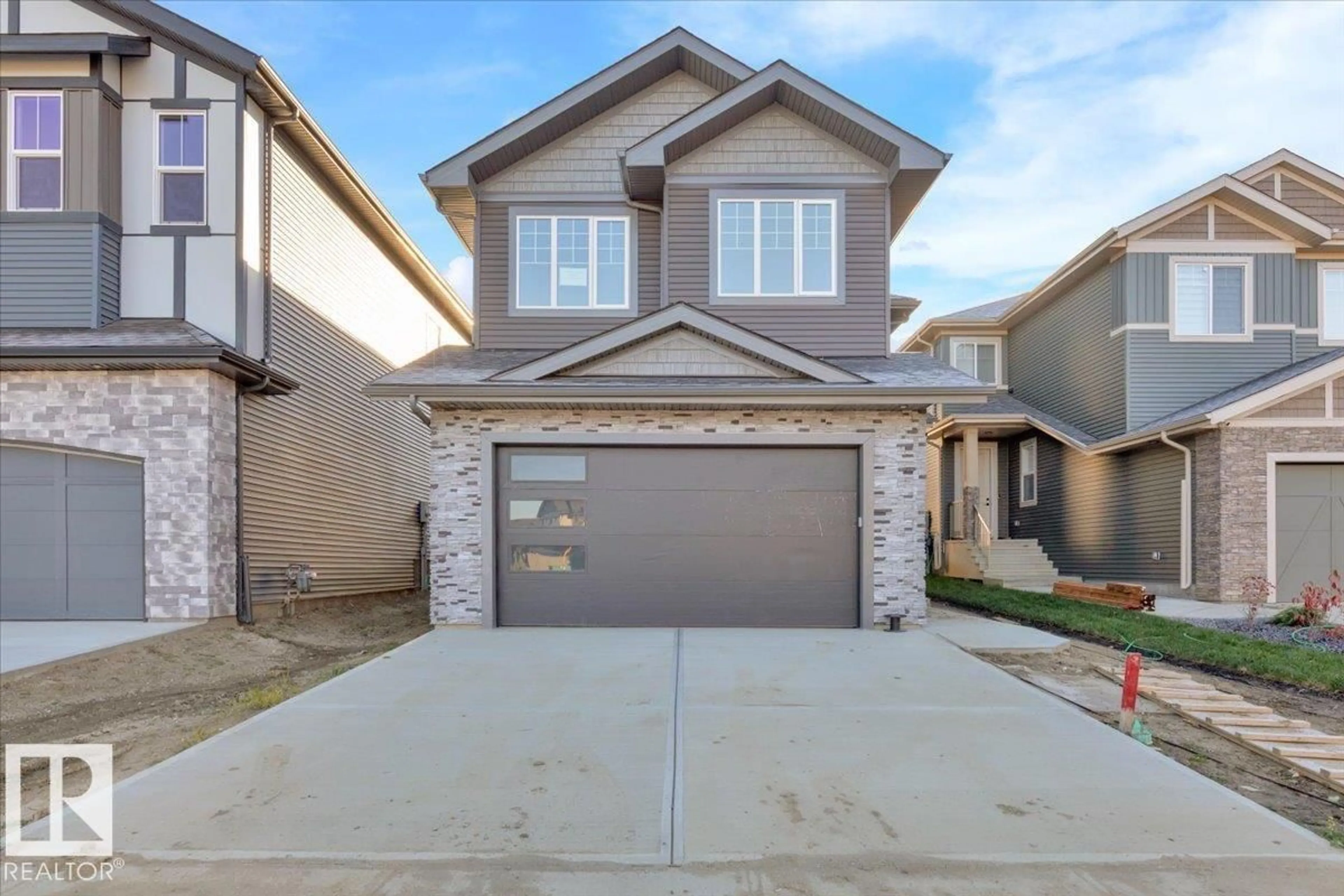 Home with brick exterior material, street for 1115 GYRFALCON CR, Edmonton Alberta T5S0S1