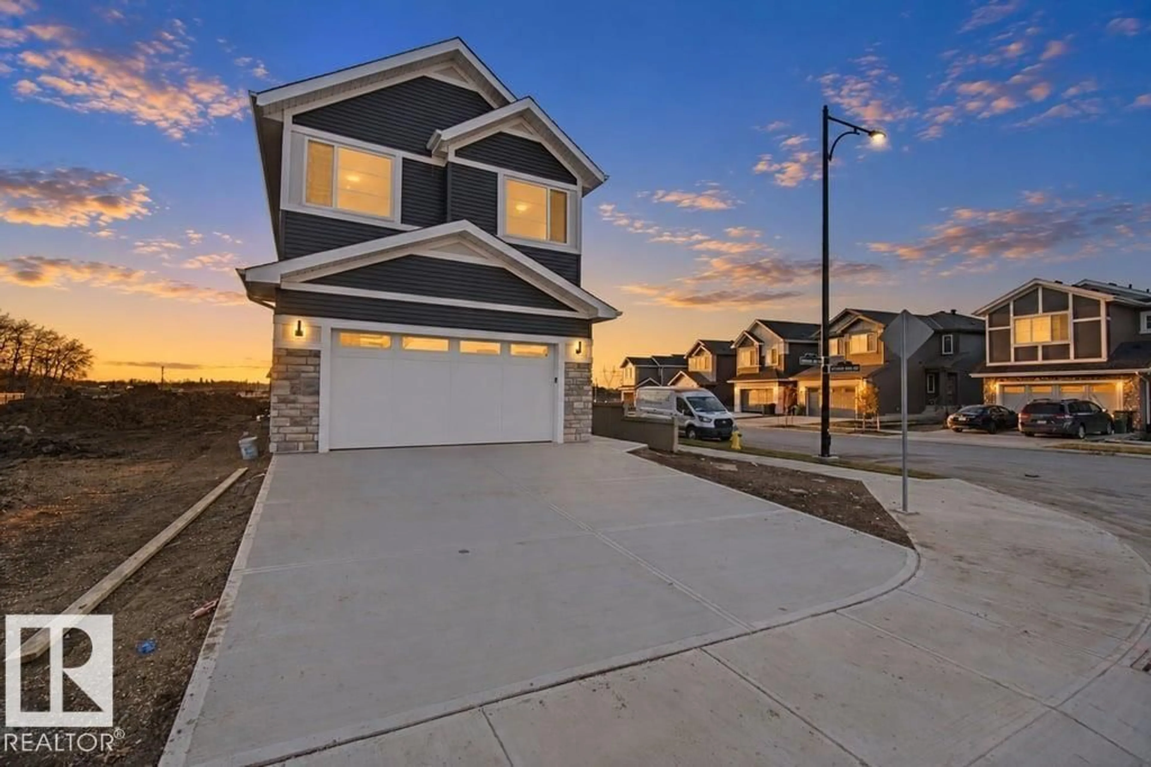 A pic from outside/outdoor area/front of a property/back of a property/a pic from drone, street for 704 ELDERBERRY CL, Edmonton Alberta T6M3J6