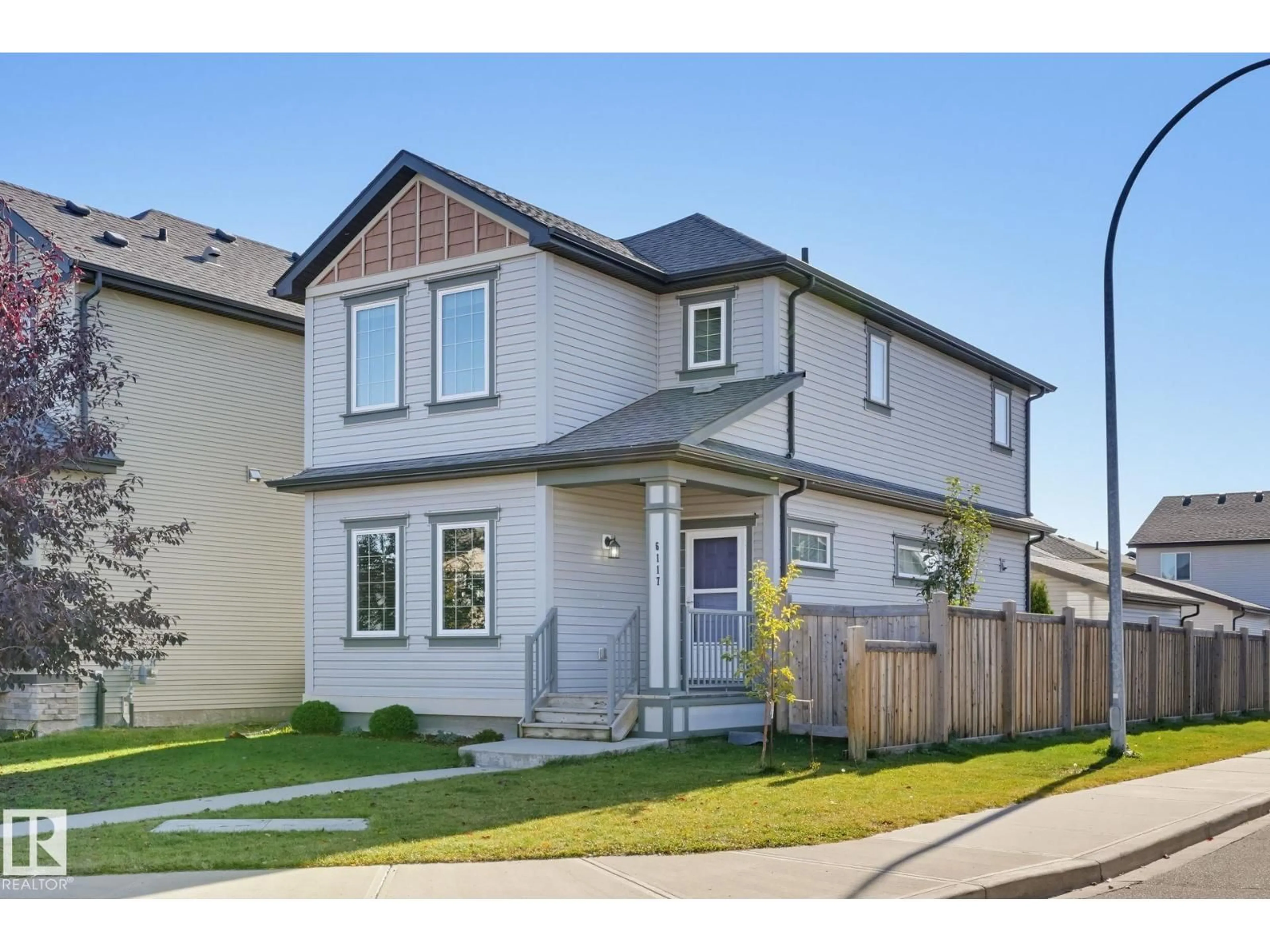 Home with vinyl exterior material, street for 6117 176A AV, Edmonton Alberta T5Y3N9