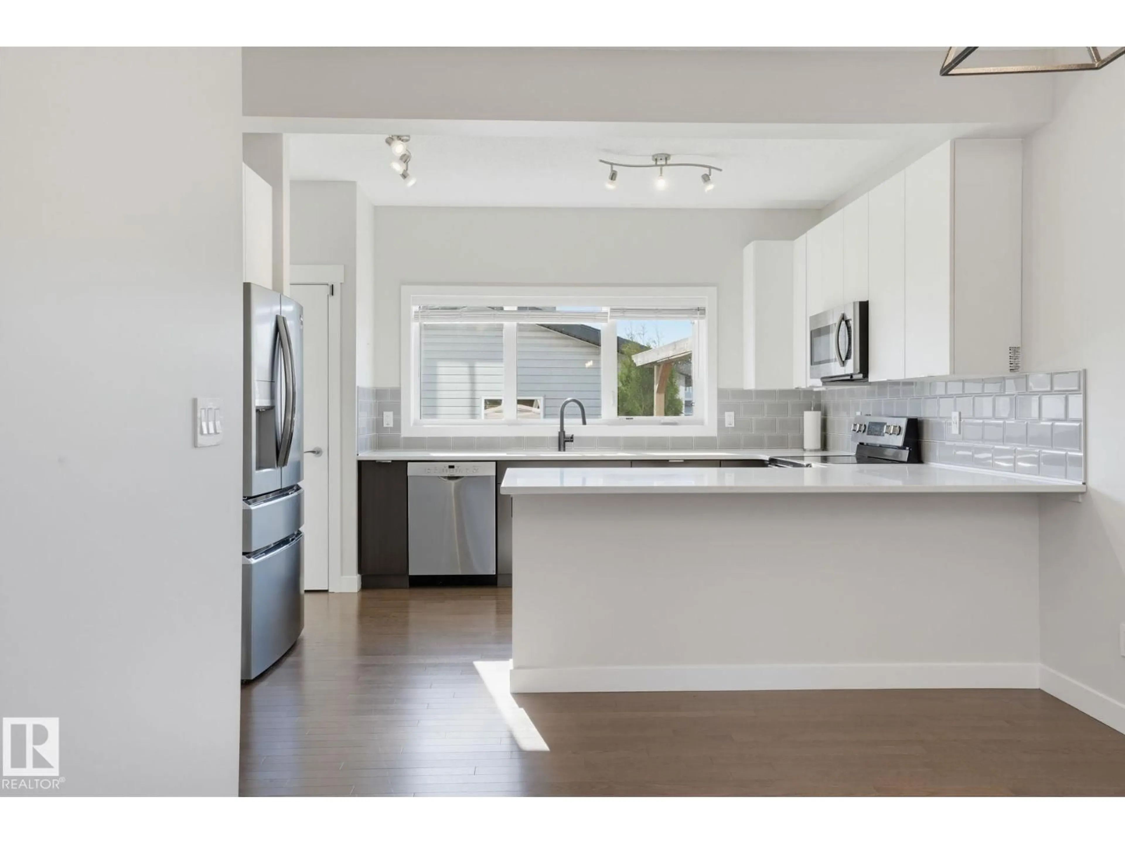 Open concept kitchen, unknown for 6117 176A AV, Edmonton Alberta T5Y3N9