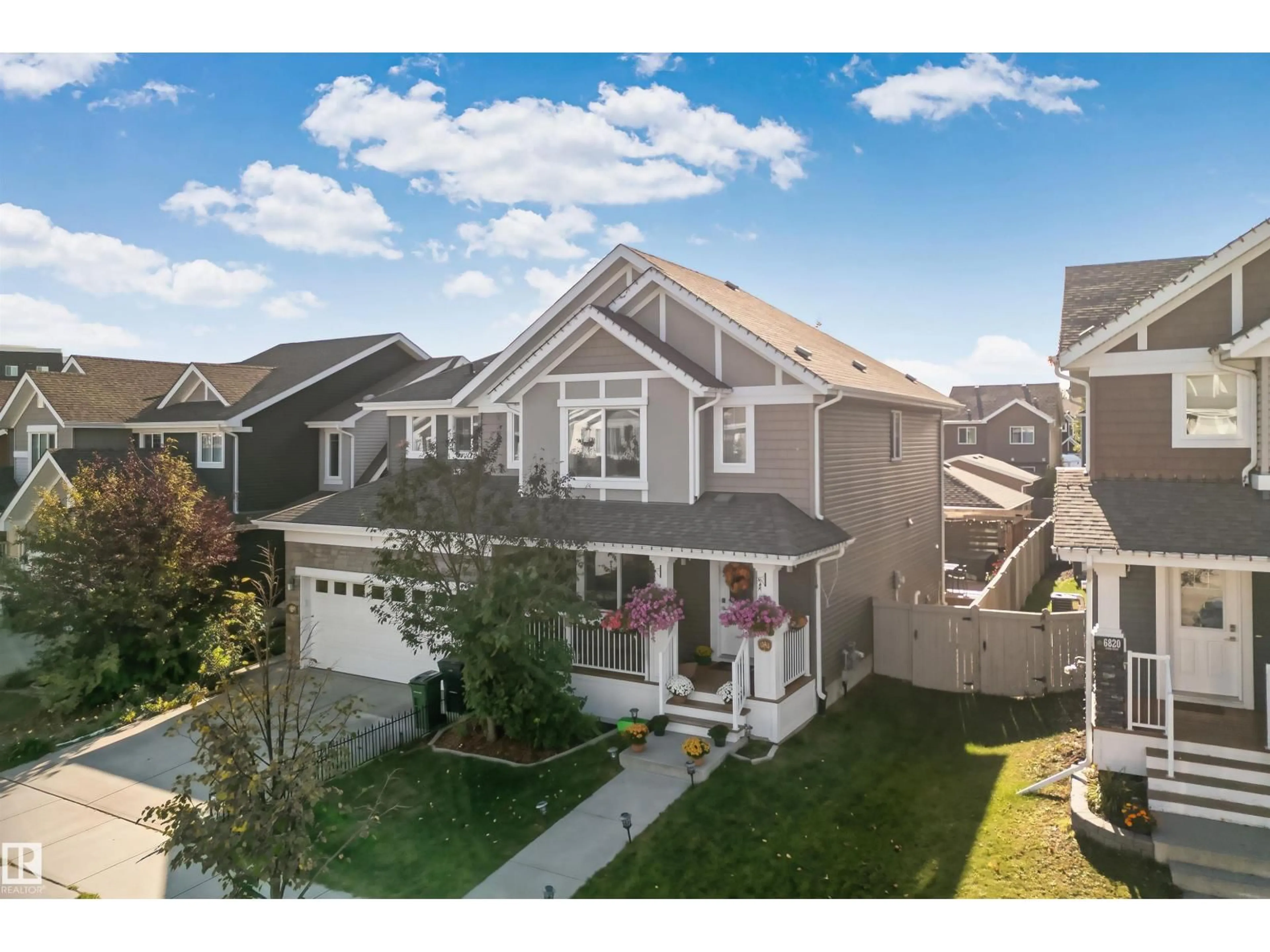 A pic from outside/outdoor area/front of a property/back of a property/a pic from drone, street for 6818 EVANS WYND, Edmonton Alberta T6M0T3