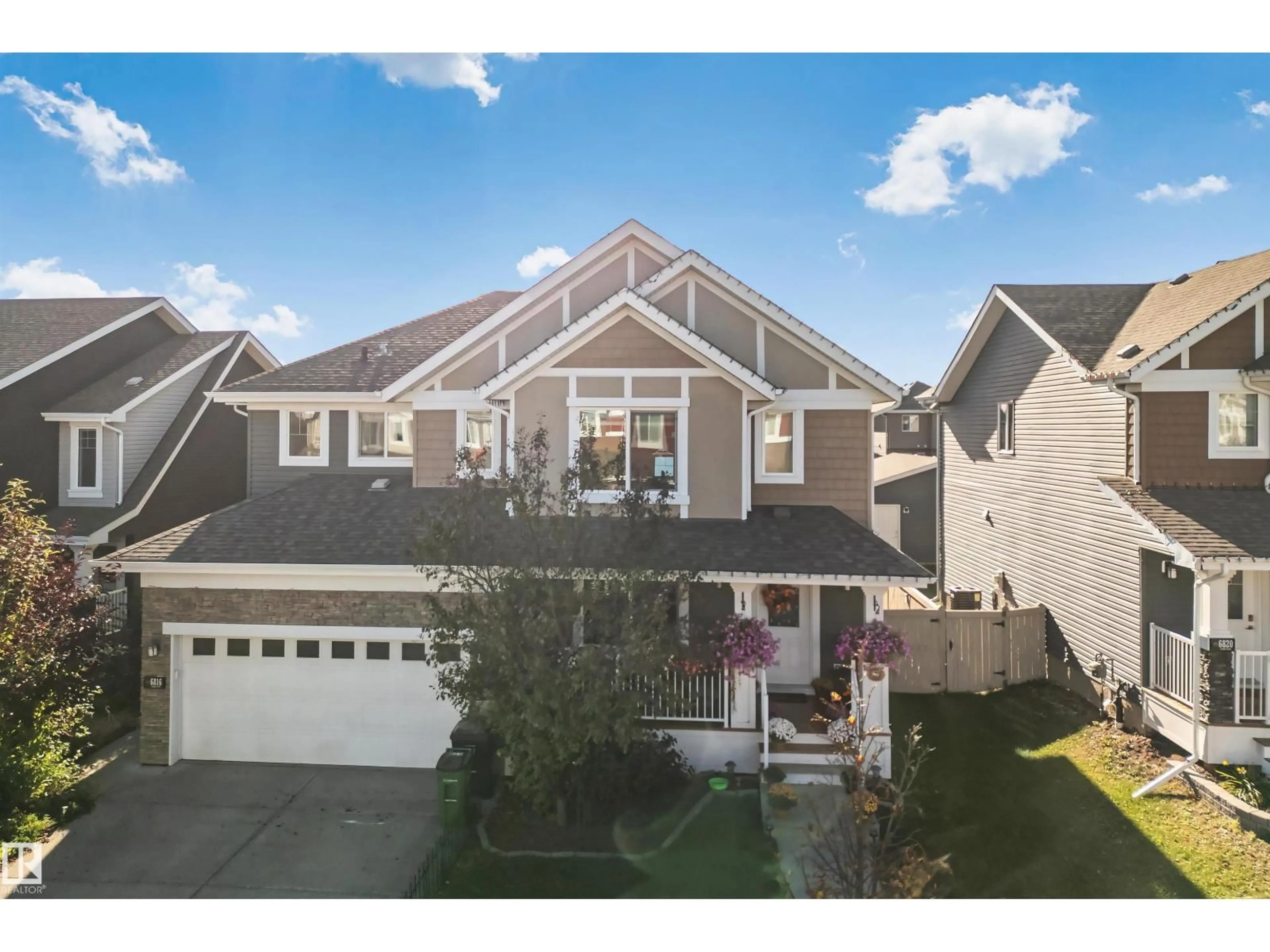 Home with vinyl exterior material, mountain view for 6818 EVANS WYND, Edmonton Alberta T6M0T3