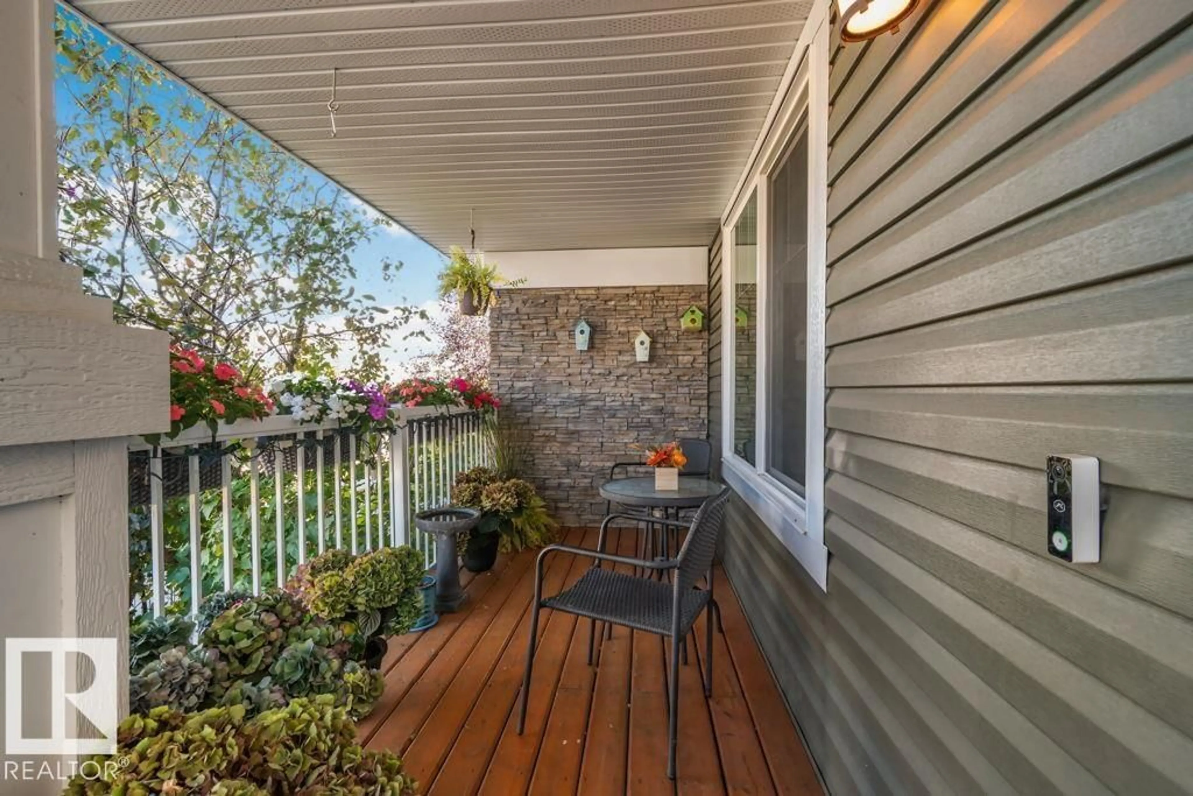 Patio, street for 6818 EVANS WYND, Edmonton Alberta T6M0T3