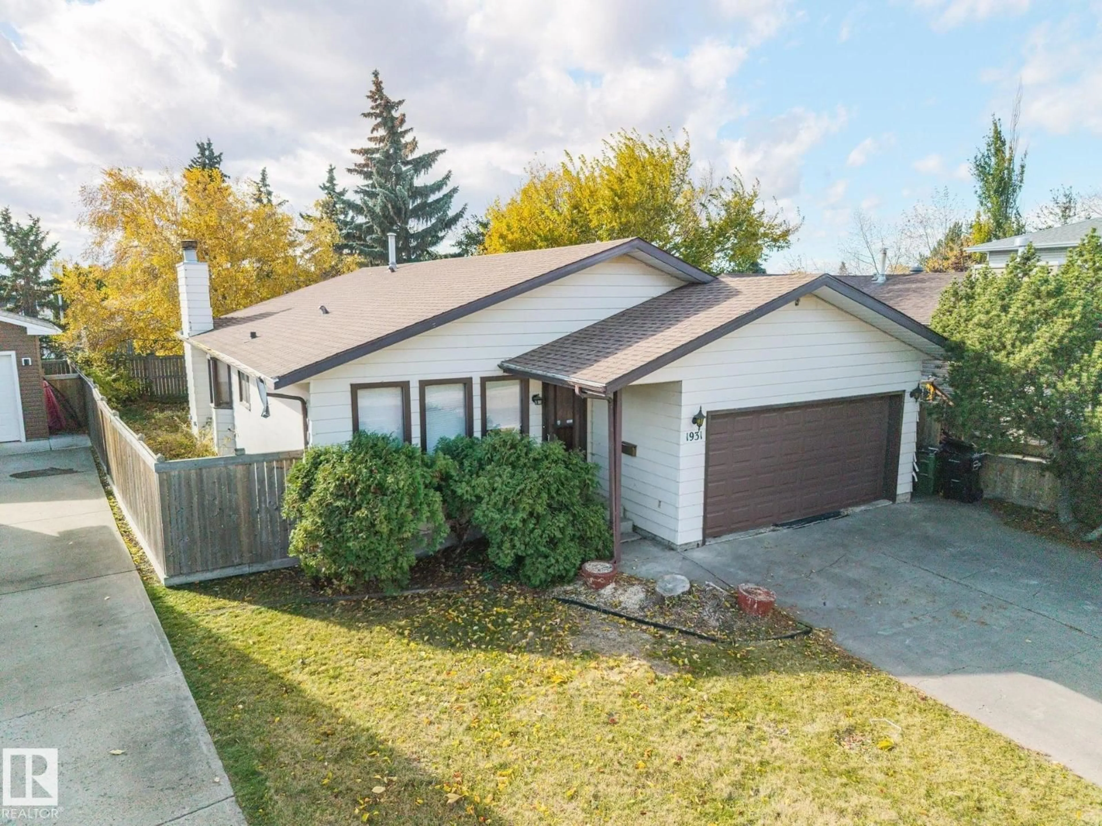 A pic from outside/outdoor area/front of a property/back of a property/a pic from drone, street for 1931 145 AV, Edmonton Alberta T5Y1V1