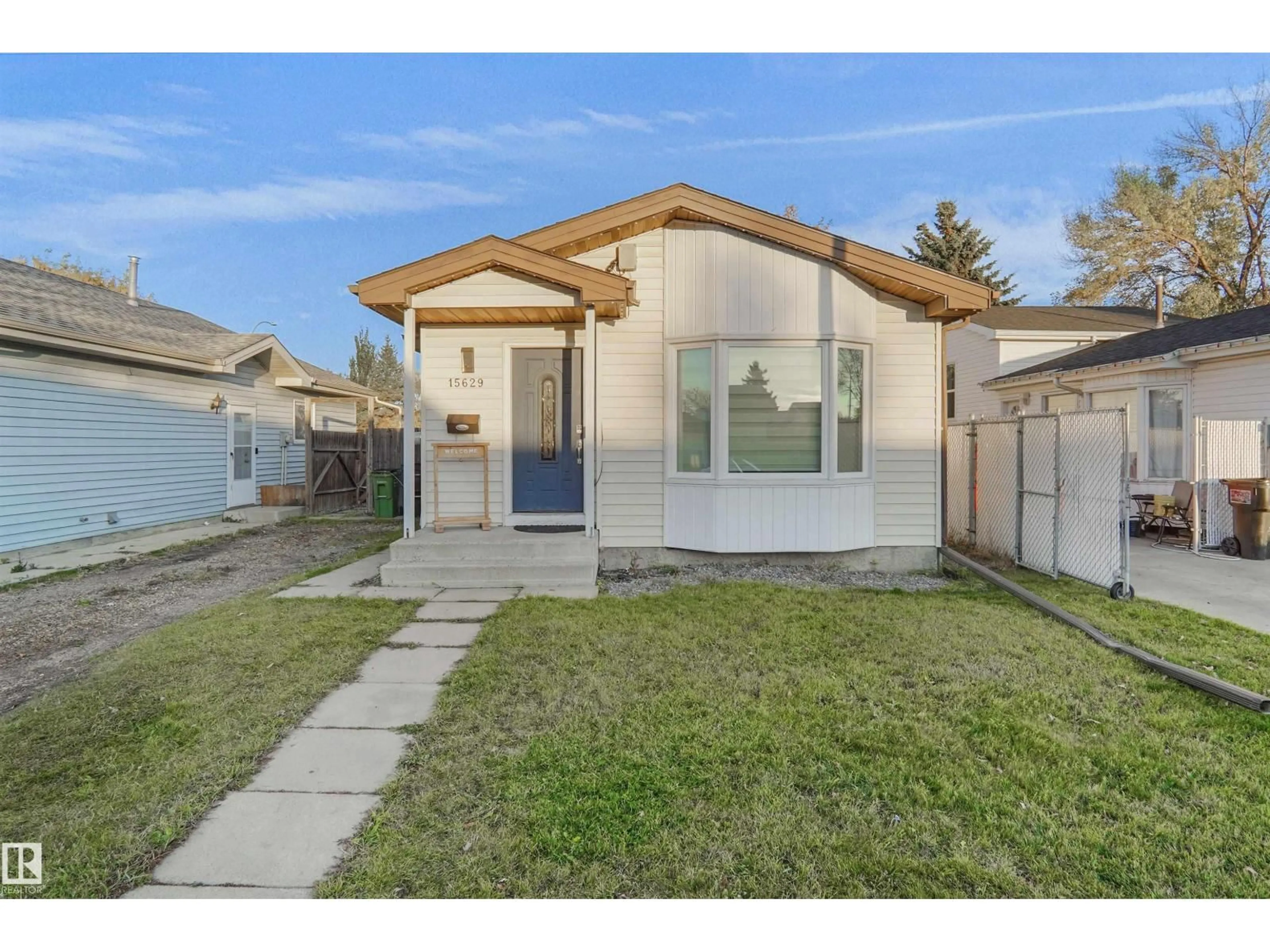 Home with vinyl exterior material, street for NW - 15629 83 ST, Edmonton Alberta T5Z2P9