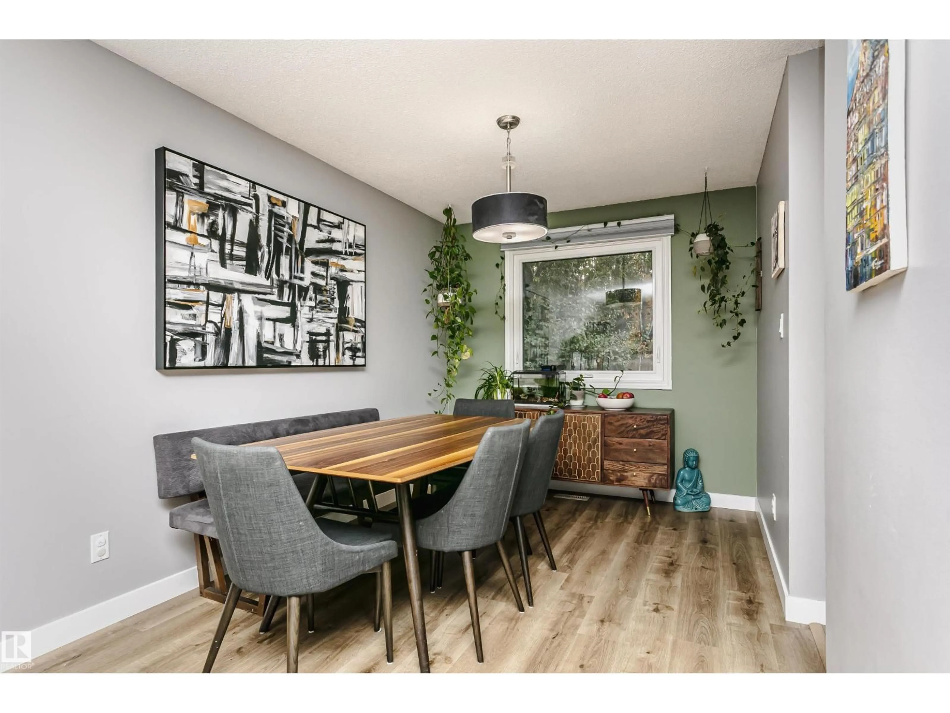 Dining room, wood/laminate floor for 10435 35A AV, Edmonton Alberta T6J2H1