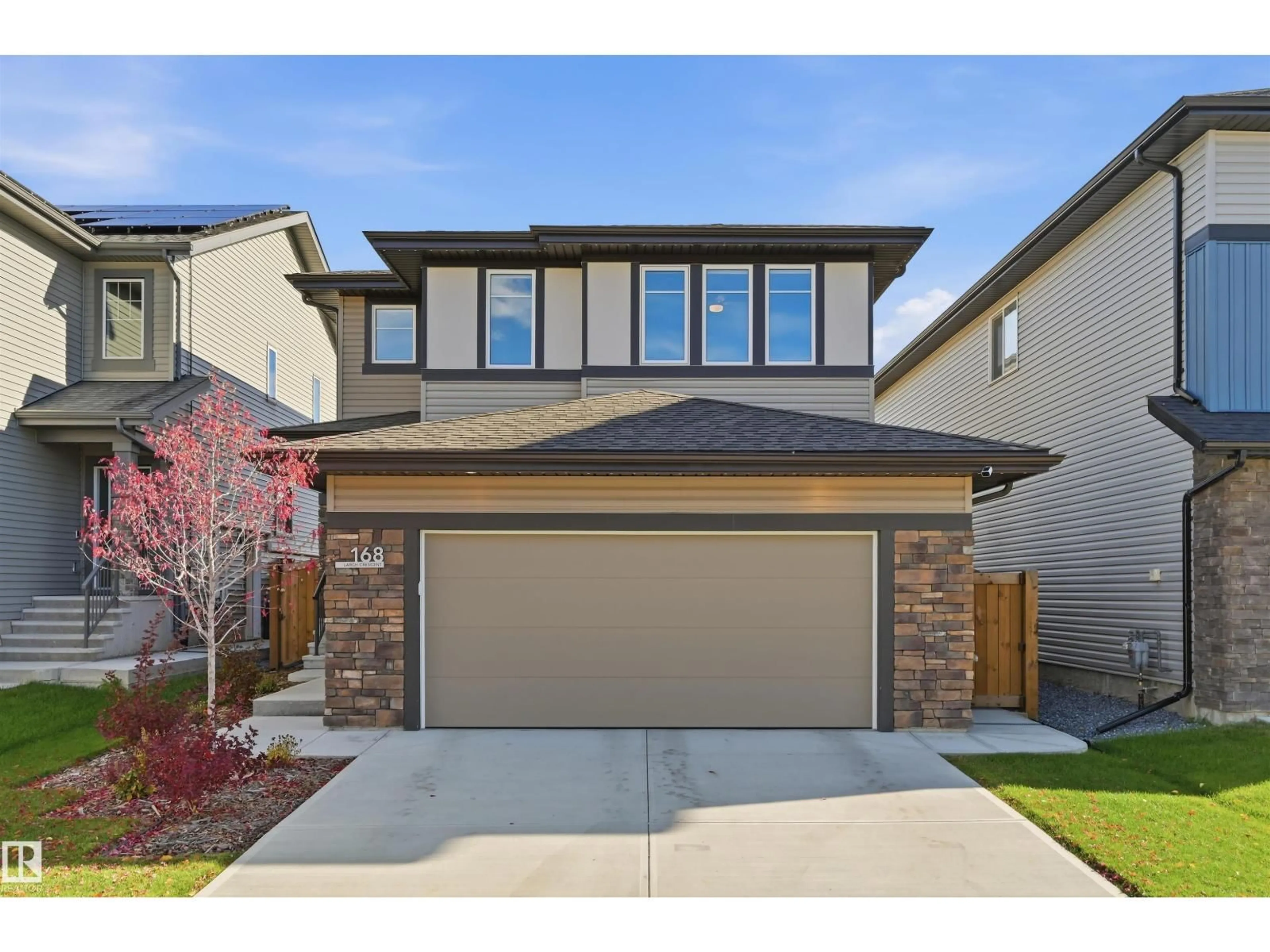 Home with brick exterior material, street for 168 LARCH CR, Leduc Alberta T9E1N3