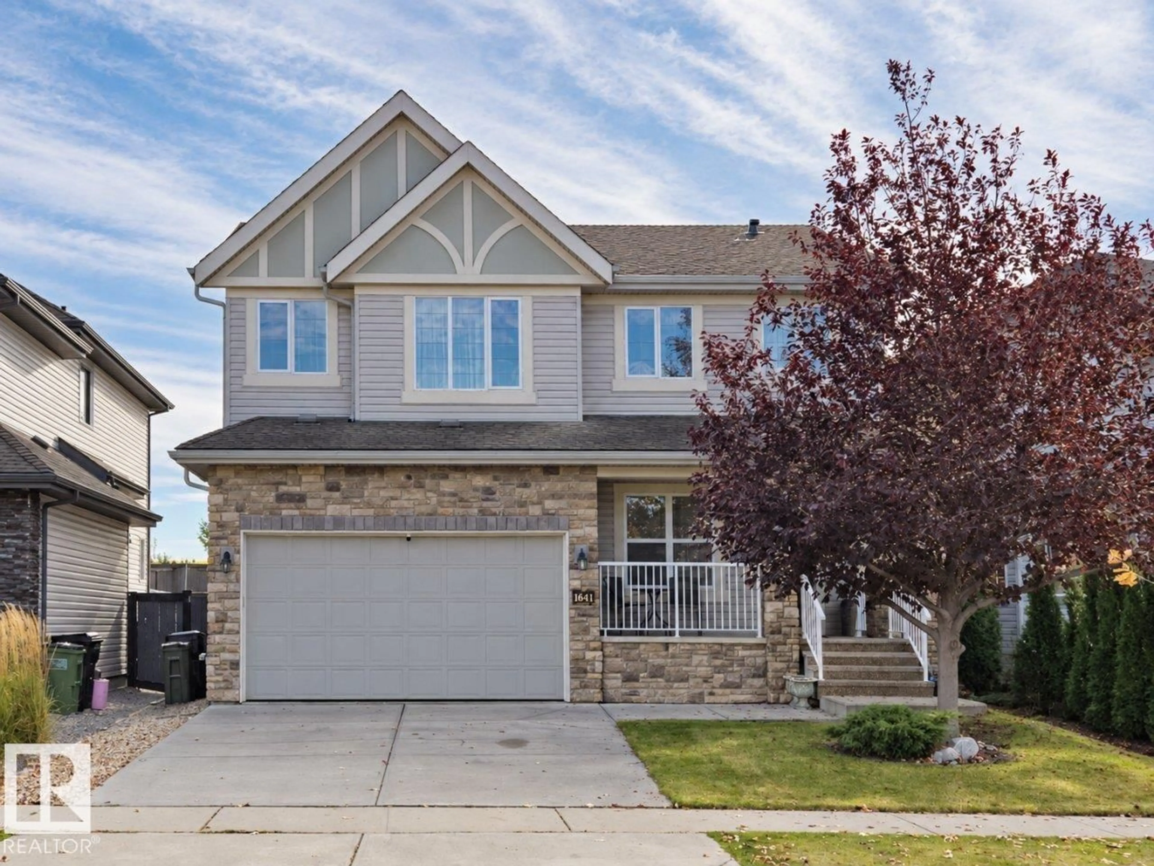 Home with vinyl exterior material, street for 1641 MALONE WY, Edmonton Alberta T6R0H4