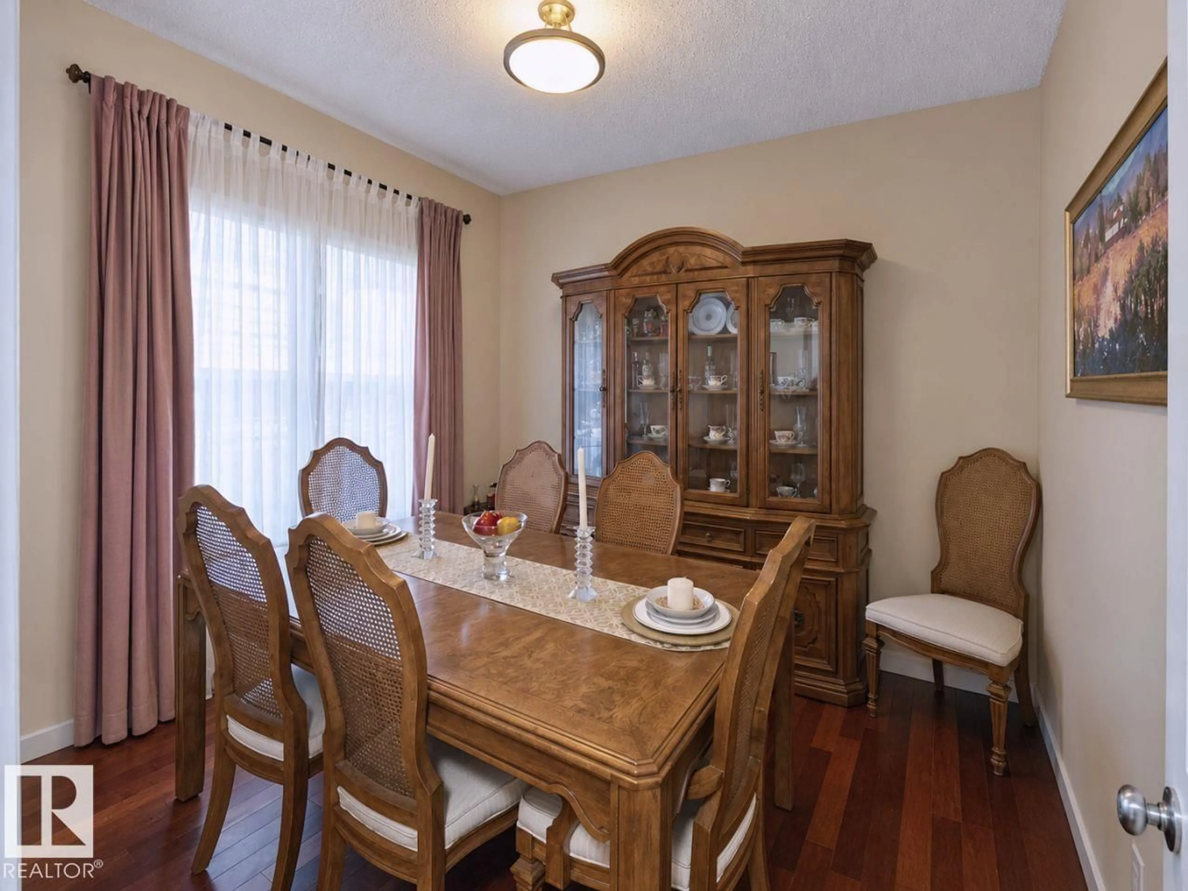 Dining room, wood/laminate floor for 1641 MALONE WY, Edmonton Alberta T6R0H4