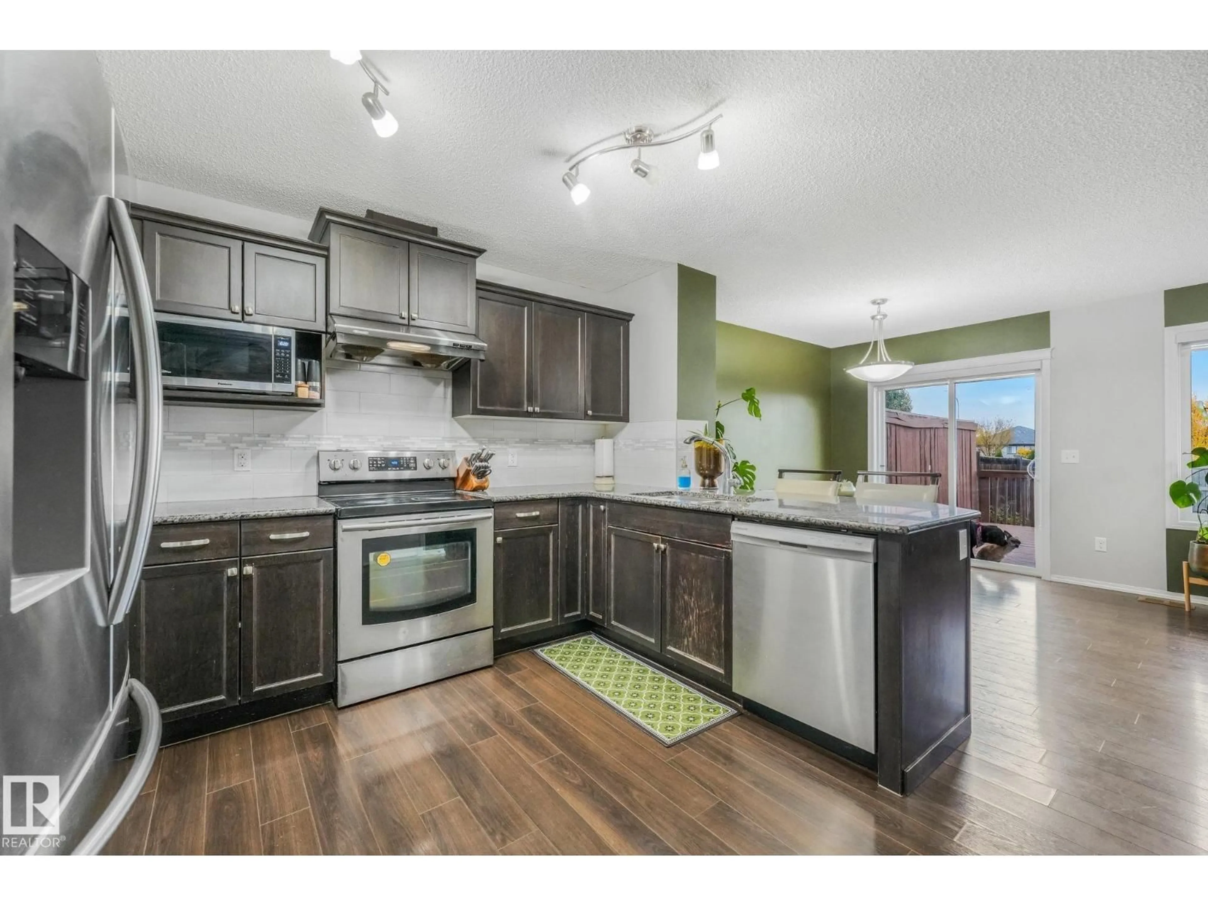 Open concept kitchen, unknown for 1947 118 ST, Edmonton Alberta T6W2E4