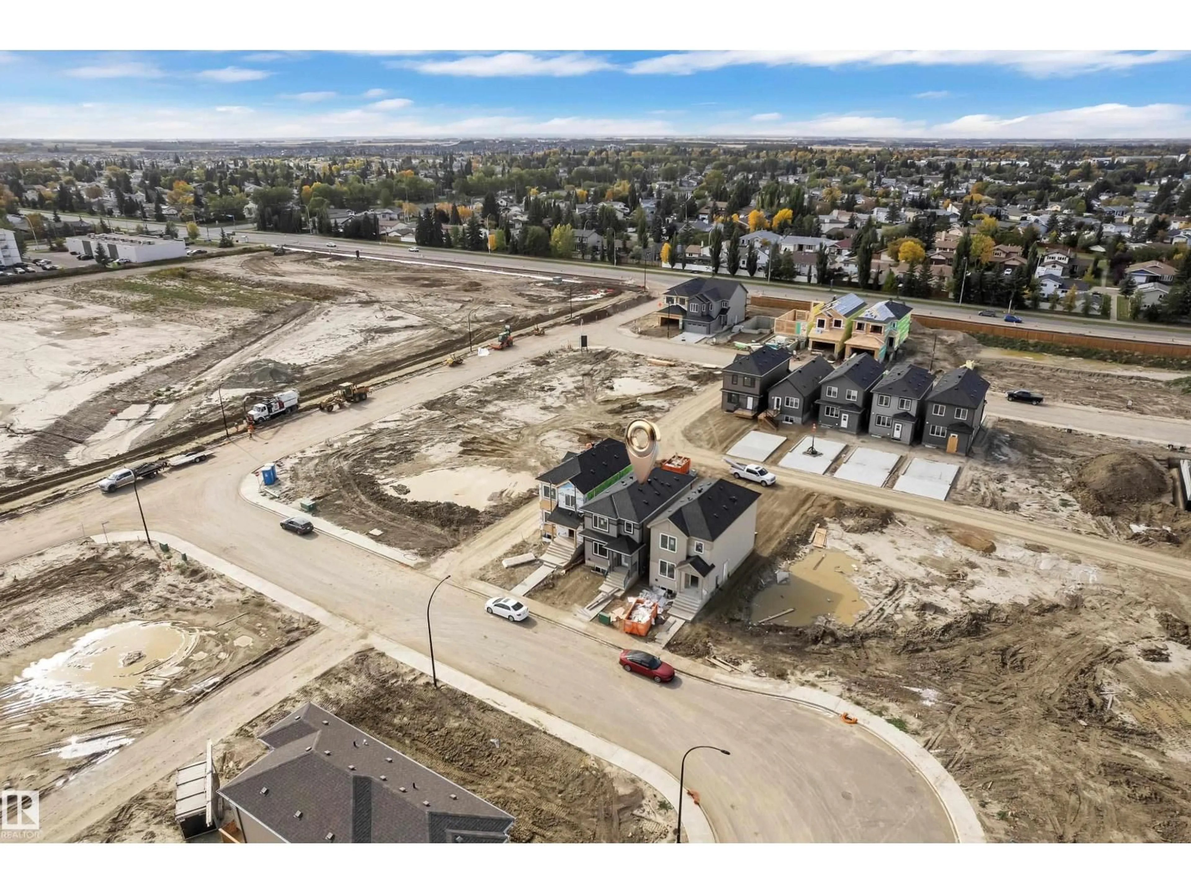 A pic from outside/outdoor area/front of a property/back of a property/a pic from drone, building for 303 FALCON CR, Leduc Alberta T9E4W3