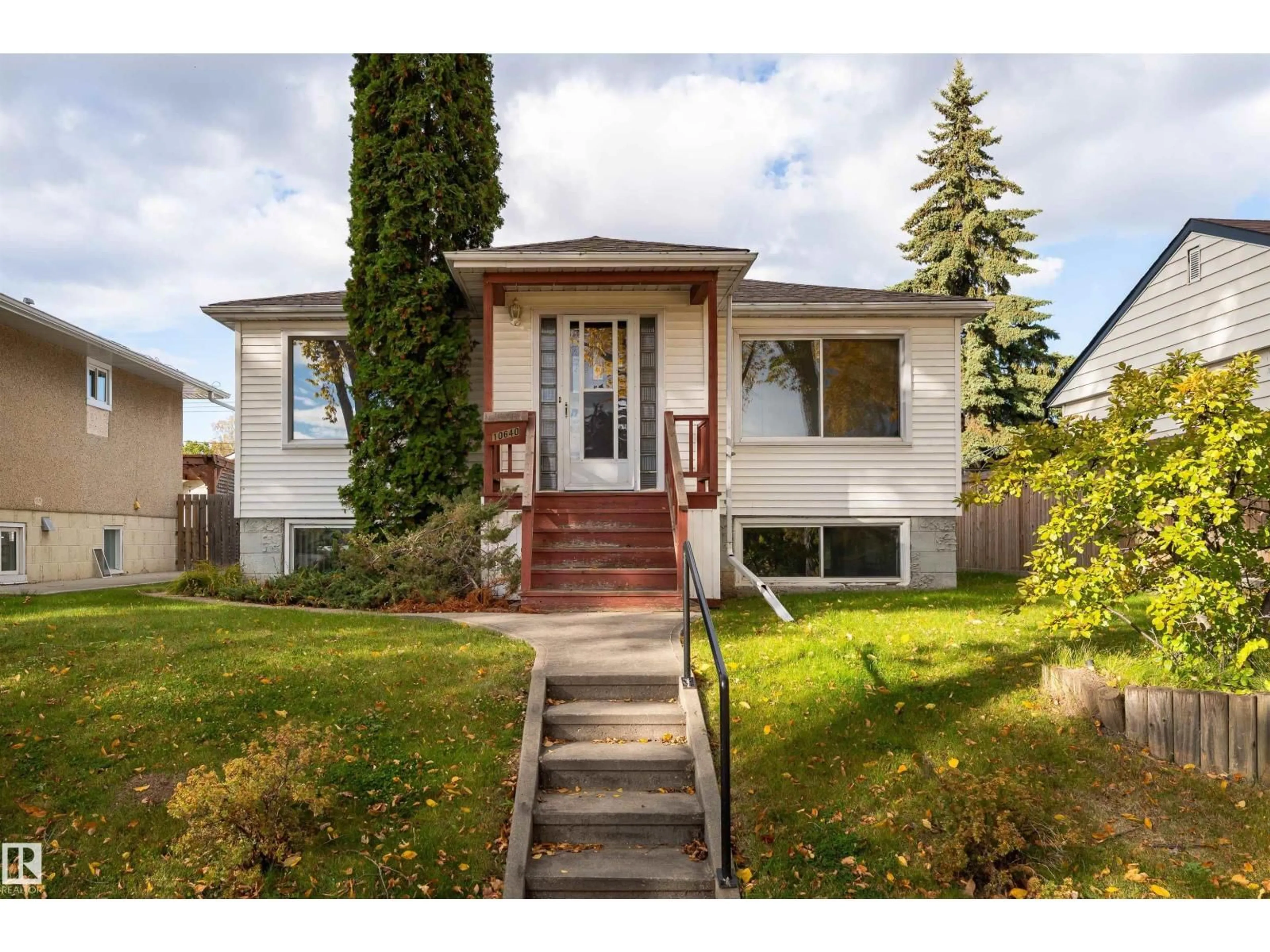 Home with vinyl exterior material, street for NW - 10640 79 ST, Edmonton Alberta T6A3H4