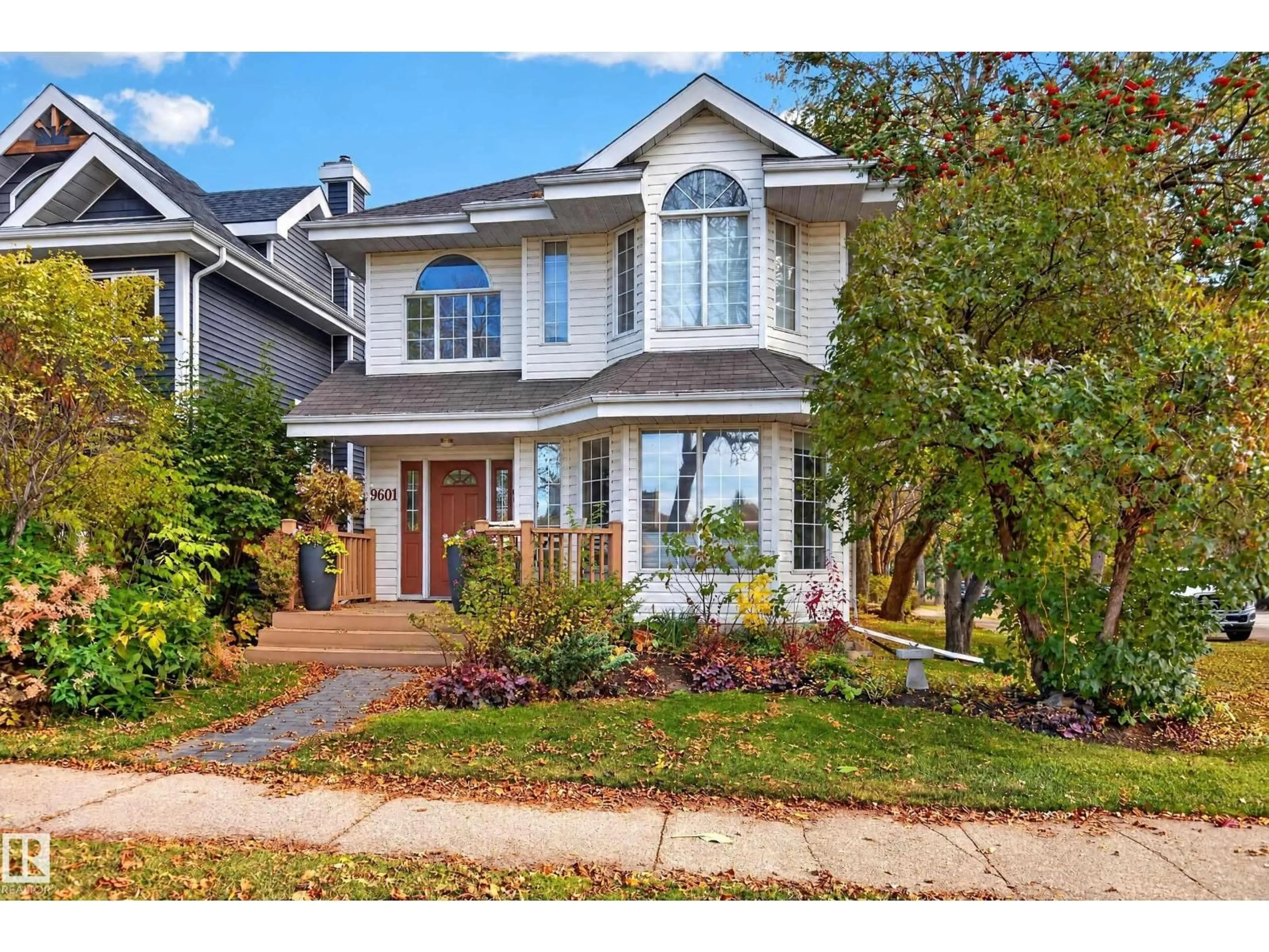 Home with vinyl exterior material, street for NW - 9601 101 ST, Edmonton Alberta T5K0W7