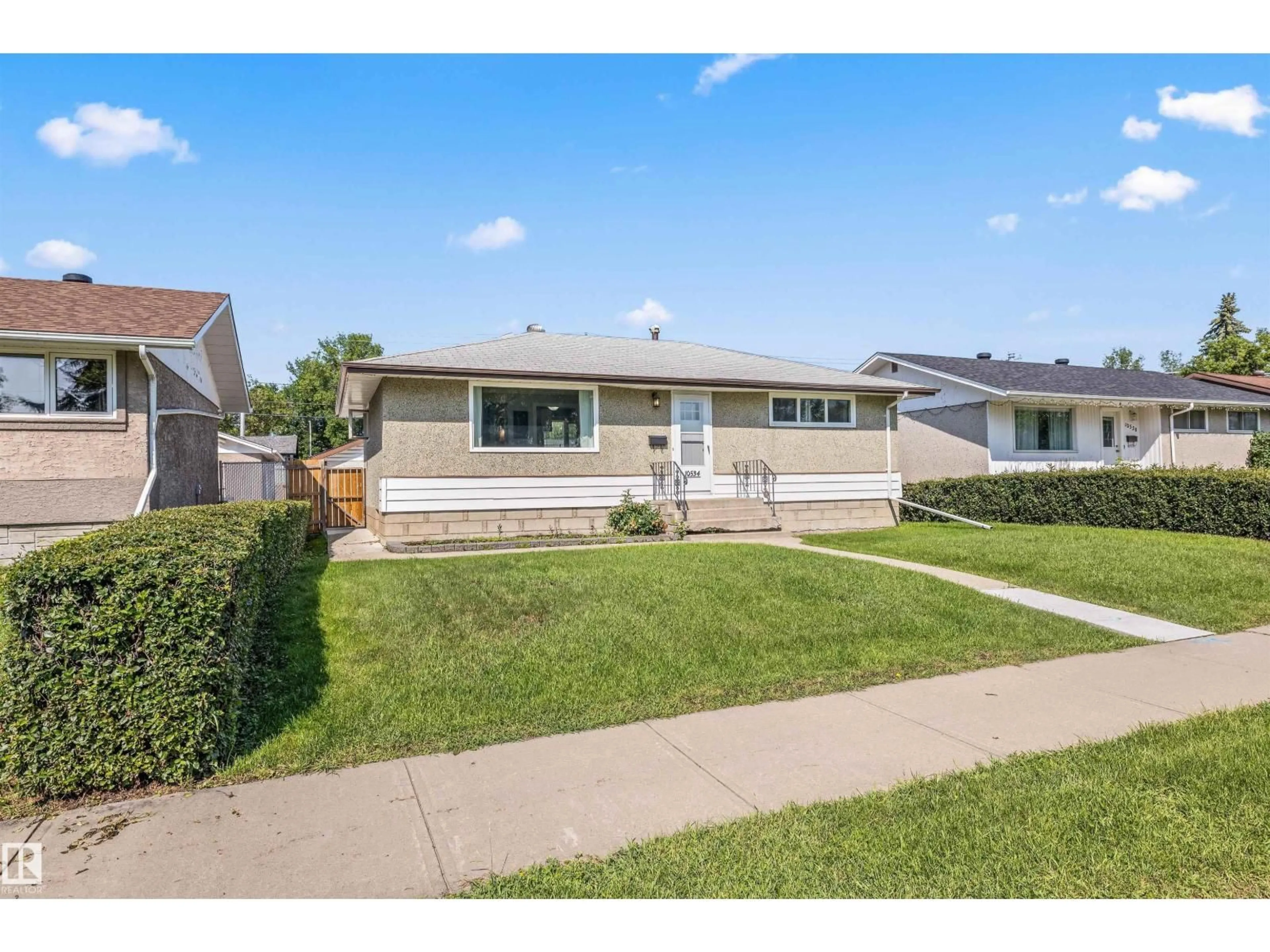 Home with vinyl exterior material, street for NW - 10534 163 ST, Edmonton Alberta T5P3P1