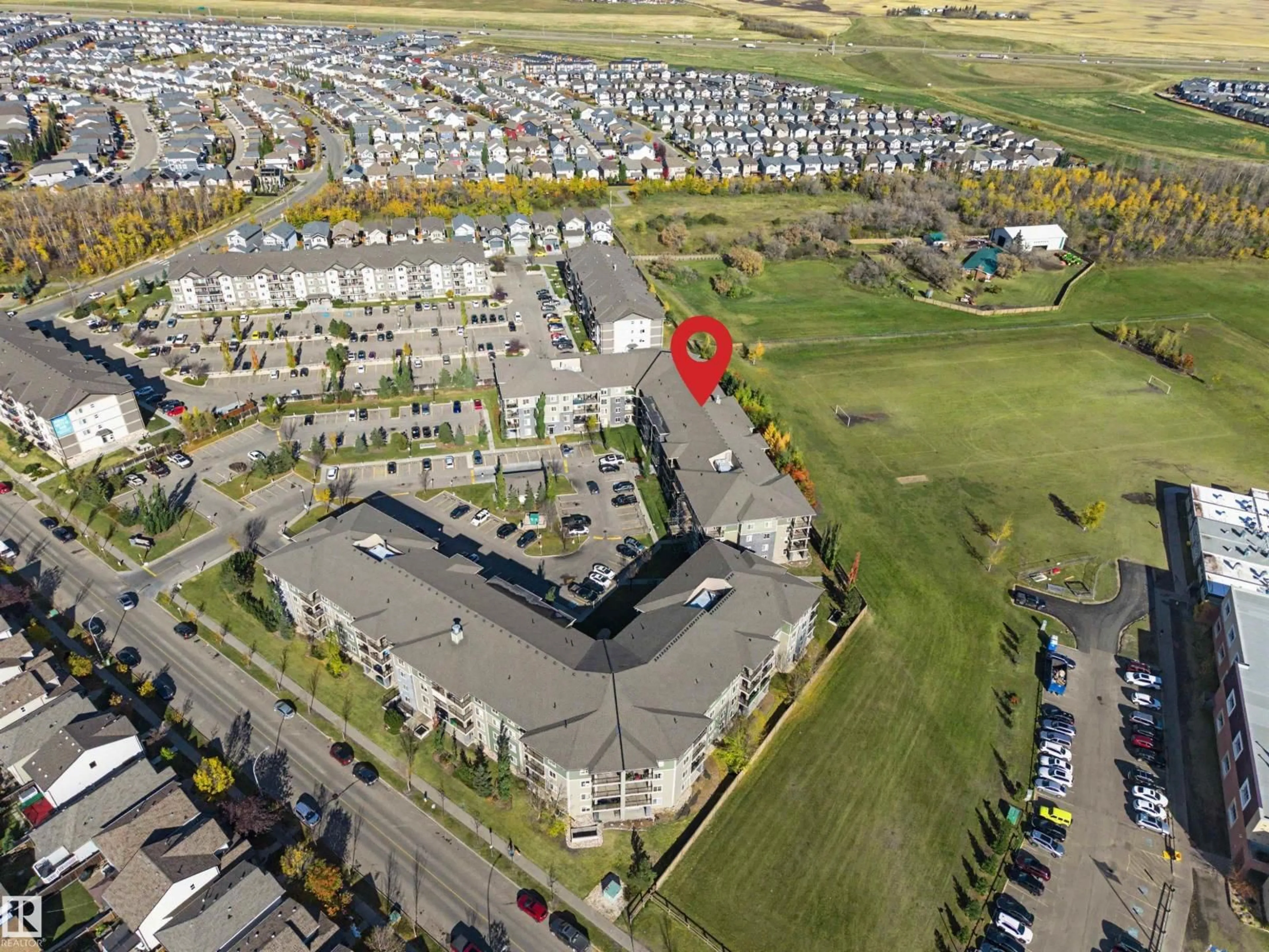 A pic from outside/outdoor area/front of a property/back of a property/a pic from drone, unknown for #101 - 274 MCCONACHIE DR, Edmonton Alberta T5Y3N4