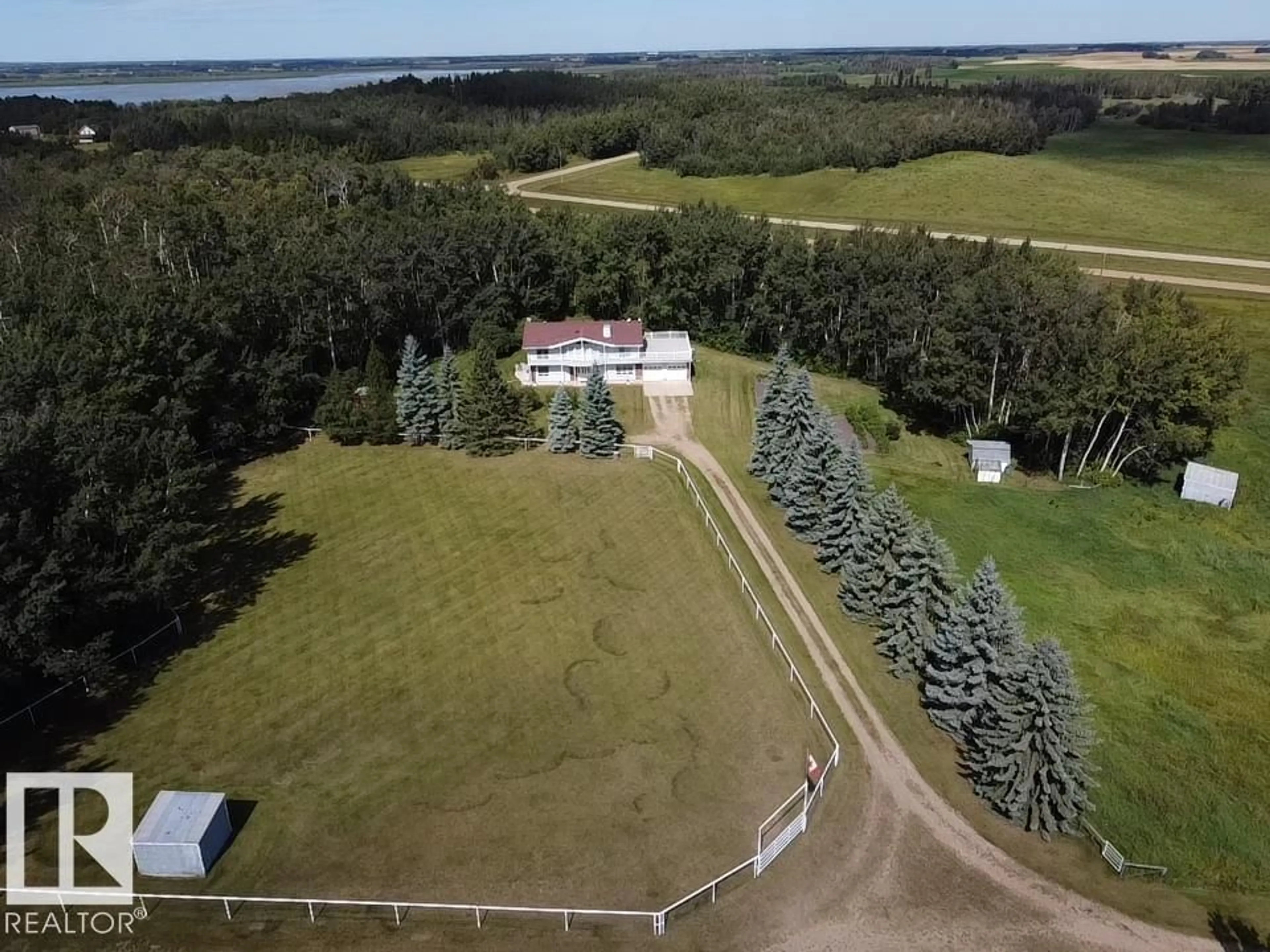 A pic from outside/outdoor area/front of a property/back of a property/a pic from drone, unknown for 254009 TWP ROAD 460, Rural Wetaskiwin County Alberta T9A1W8