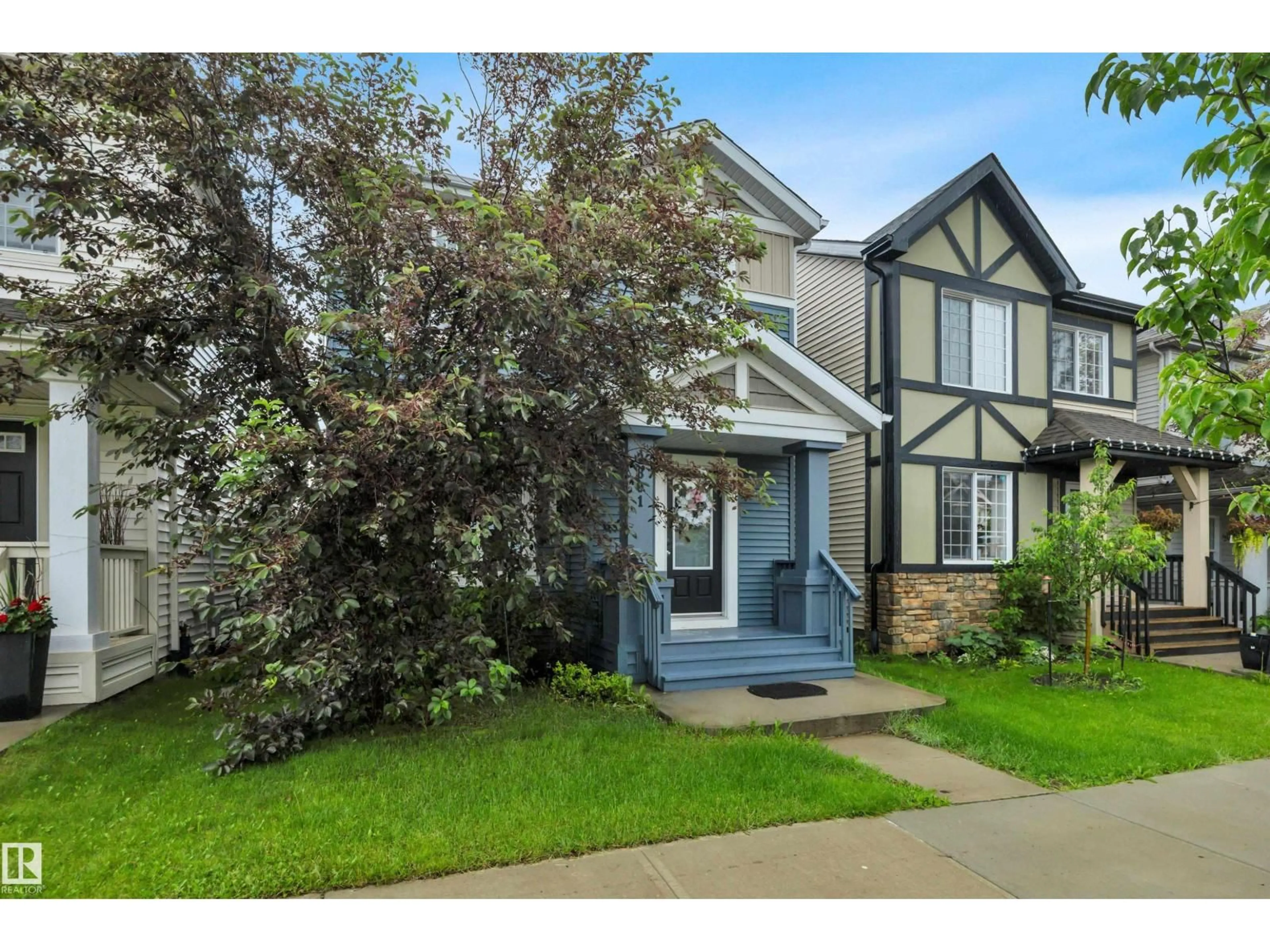 Home with vinyl exterior material, street for SW - 2801 COUGHLAN GR, Edmonton Alberta T6W3P1
