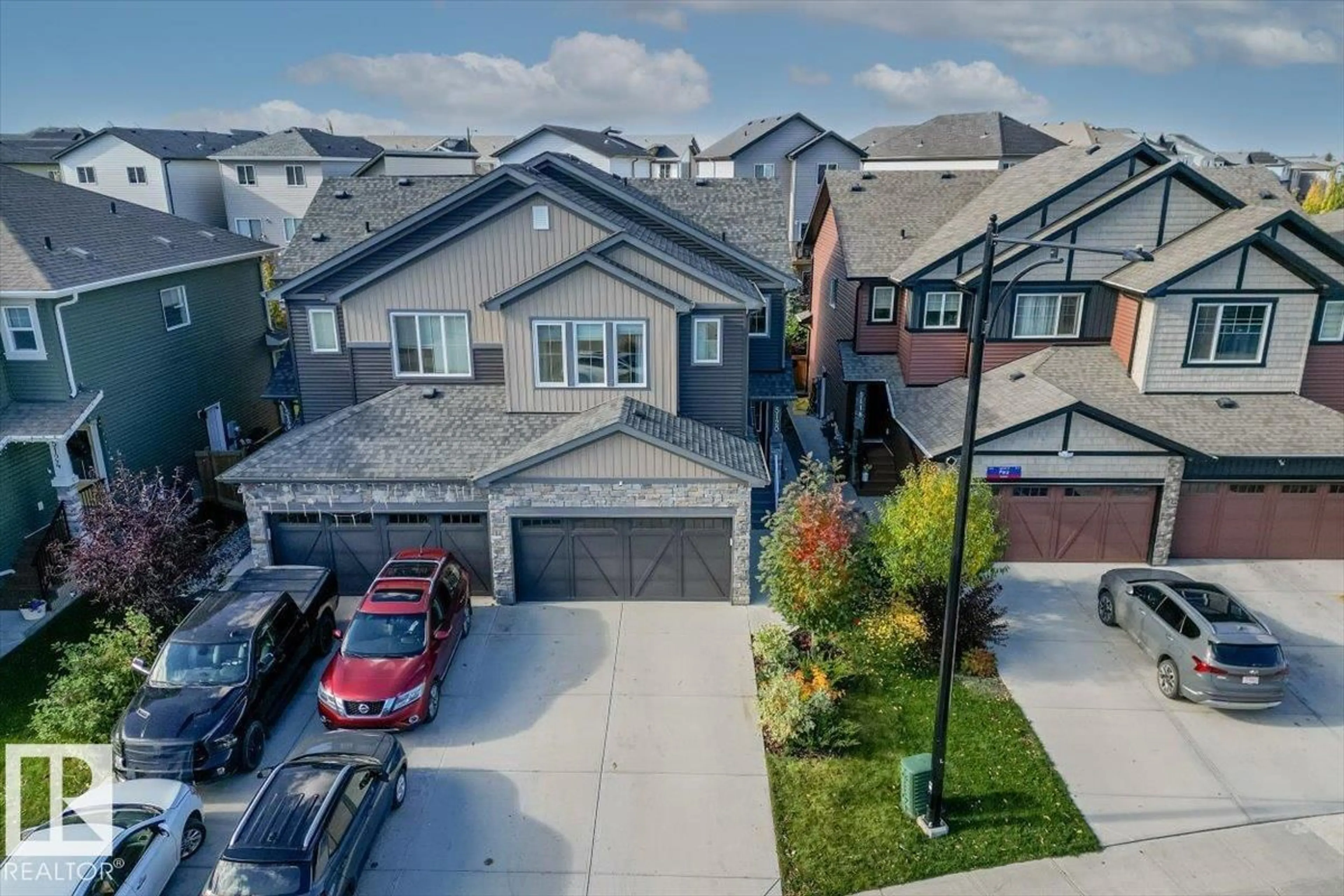 A pic from outside/outdoor area/front of a property/back of a property/a pic from drone, street for 5120 LARK CR, Edmonton Alberta T5S0N9