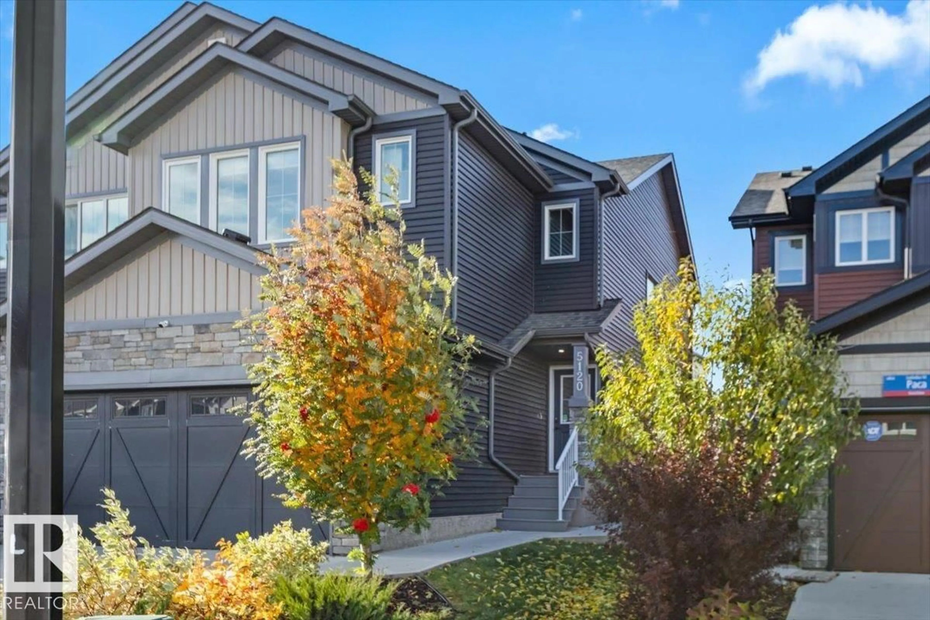 Home with vinyl exterior material, street for 5120 LARK CR, Edmonton Alberta T5S0N9