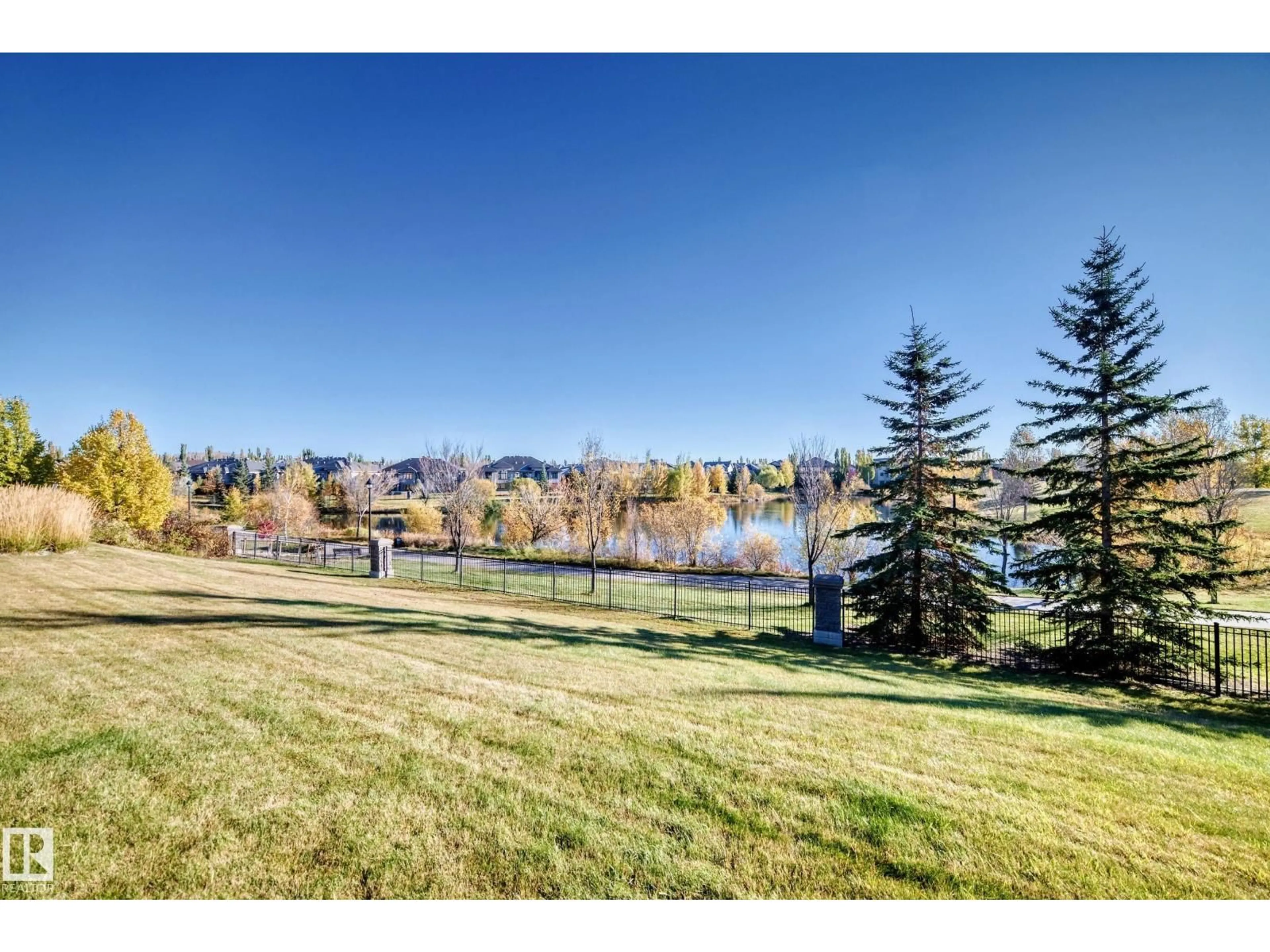 A pic from outside/outdoor area/front of a property/back of a property/a pic from drone, water/lake/river/ocean view for 6079 - 433 MAYNARD WAY, Edmonton Alberta T6R0S4