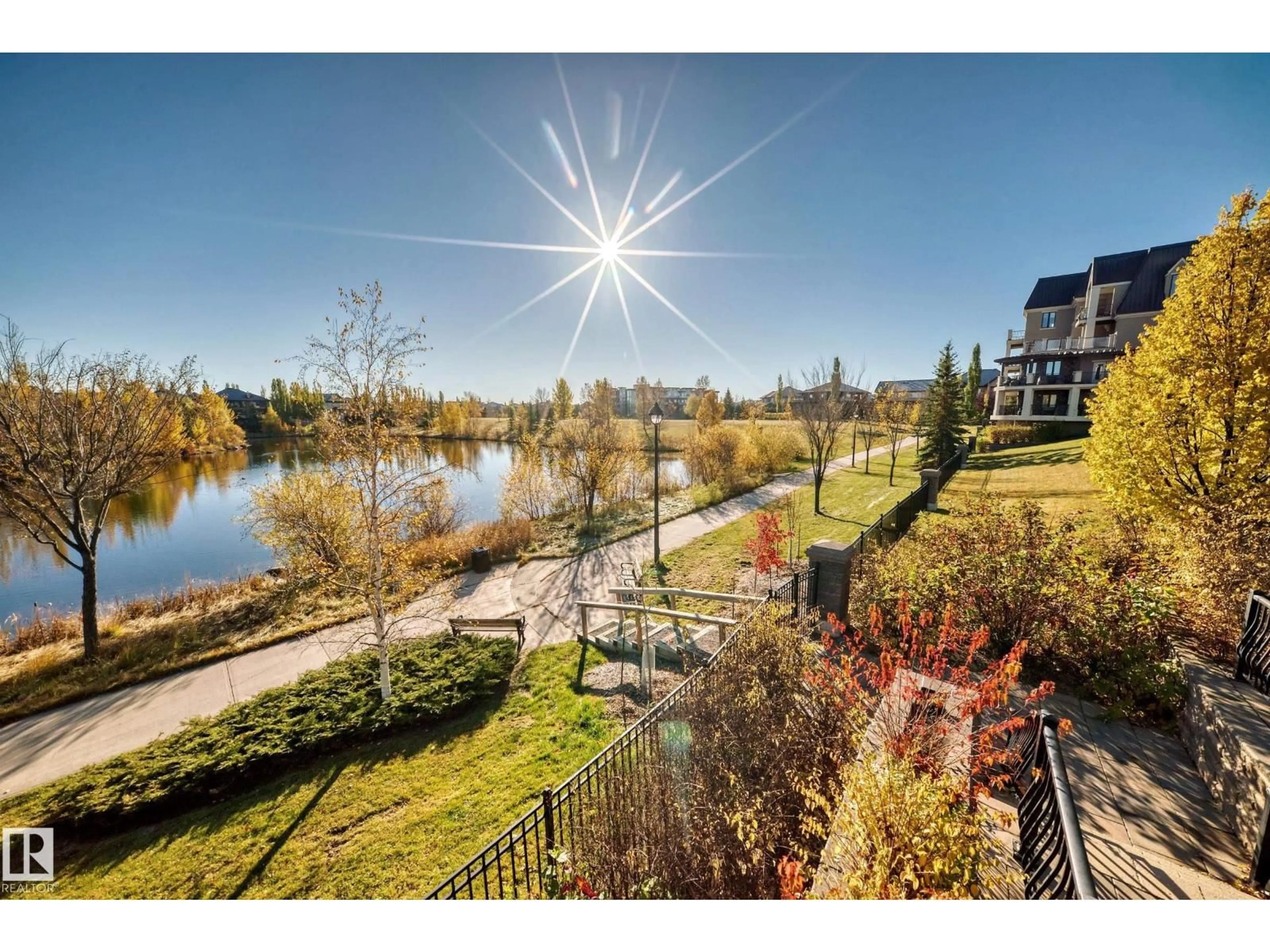 A pic from outside/outdoor area/front of a property/back of a property/a pic from drone, water/lake/river/ocean view for 6079 - 433 MAYNARD WAY, Edmonton Alberta T6R0S4