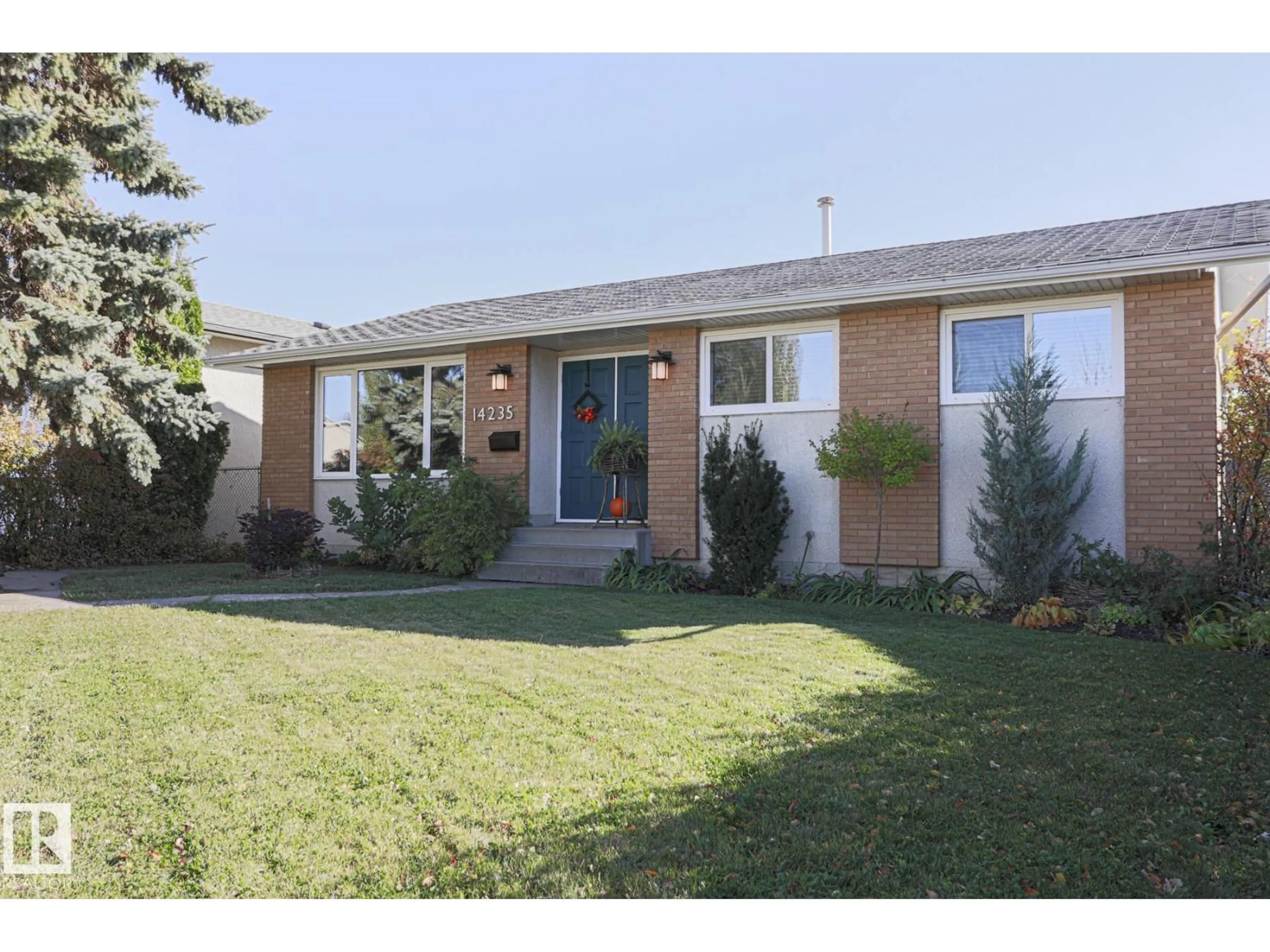 Home with brick exterior material, street for NW - 14235 53 ST, Edmonton Alberta T5A1L6
