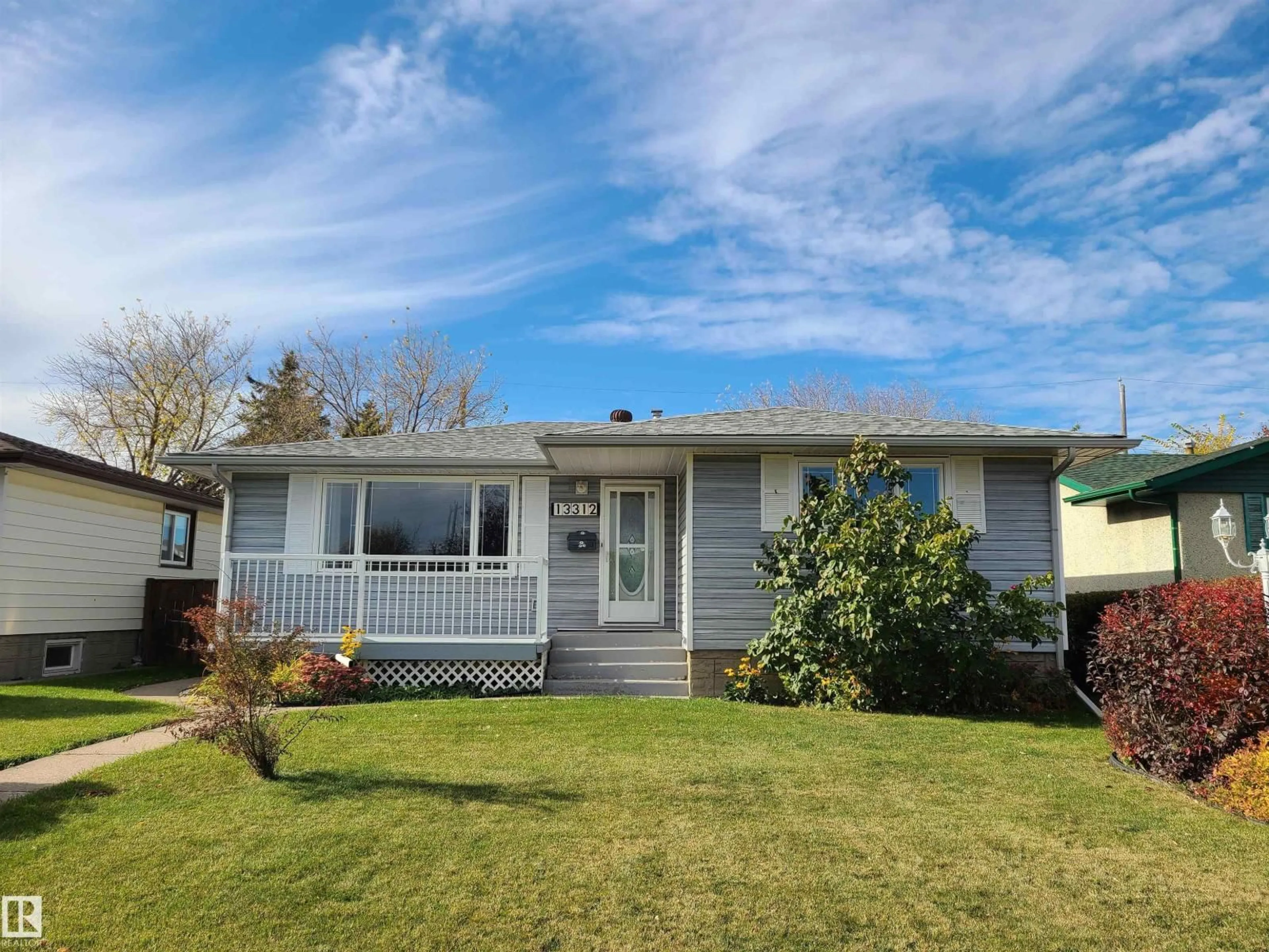 Home with vinyl exterior material, street for NW - 13312 123 ST, Edmonton Alberta T5L0J9