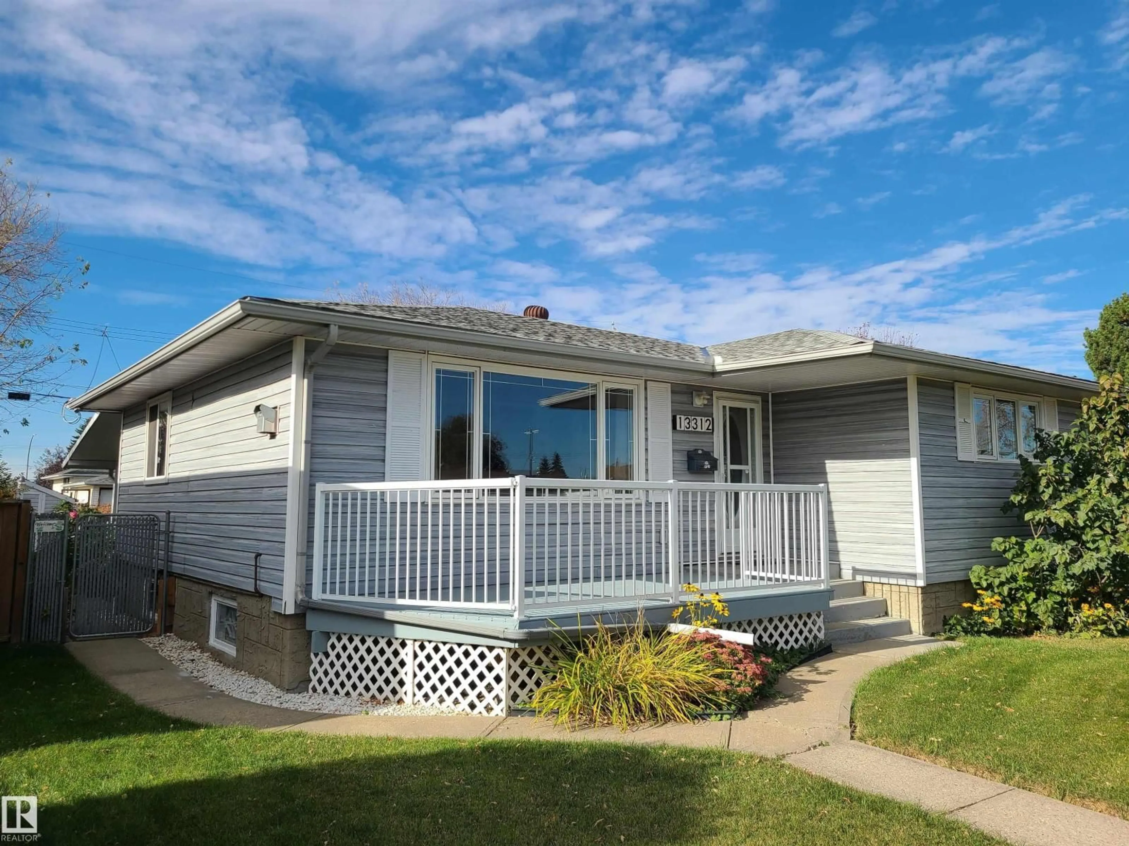 Home with vinyl exterior material, street for NW - 13312 123 ST, Edmonton Alberta T5L0J9