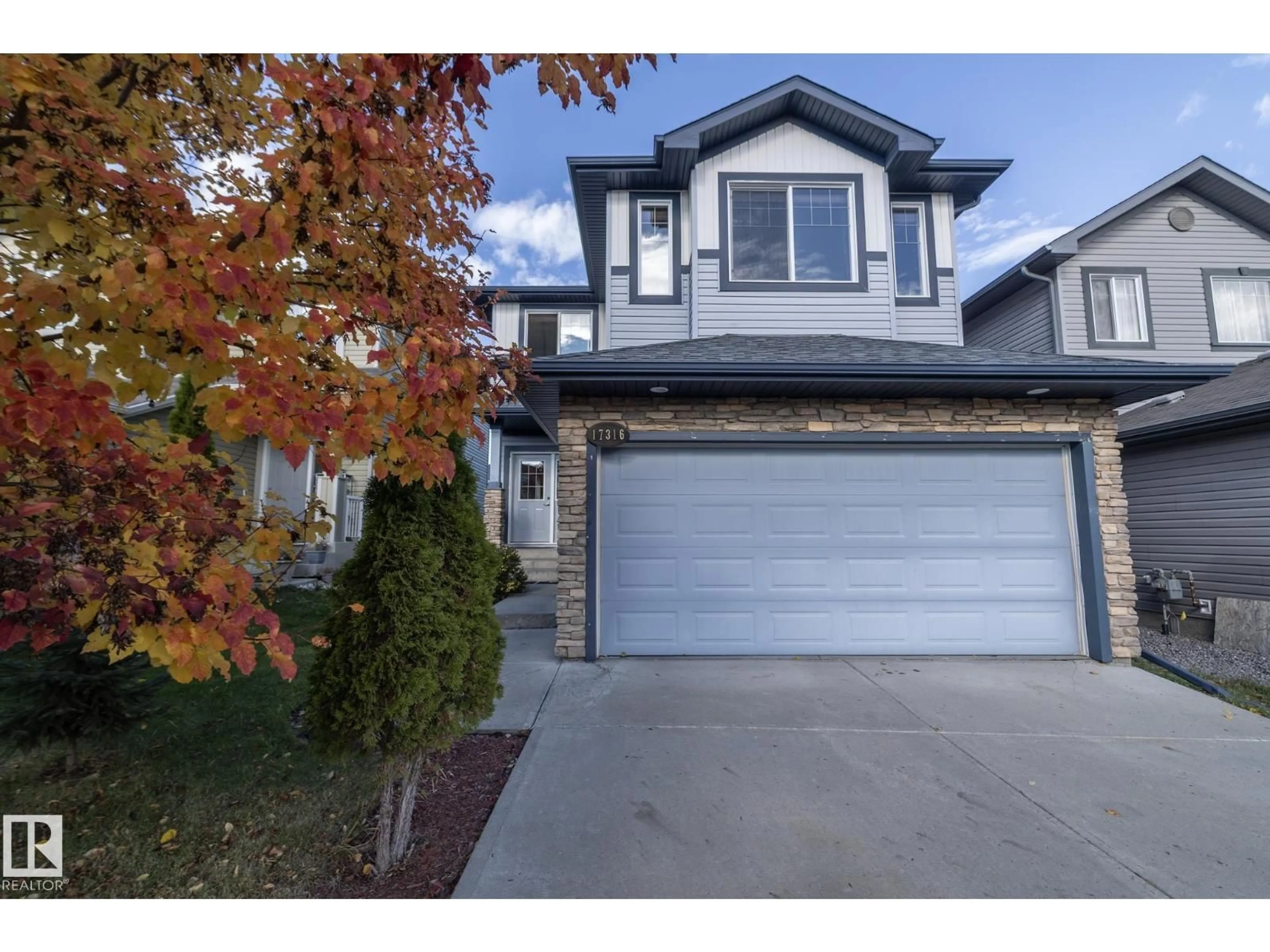Home with vinyl exterior material, street for SW - 17316 5 AV, Edmonton Alberta T6W2A5