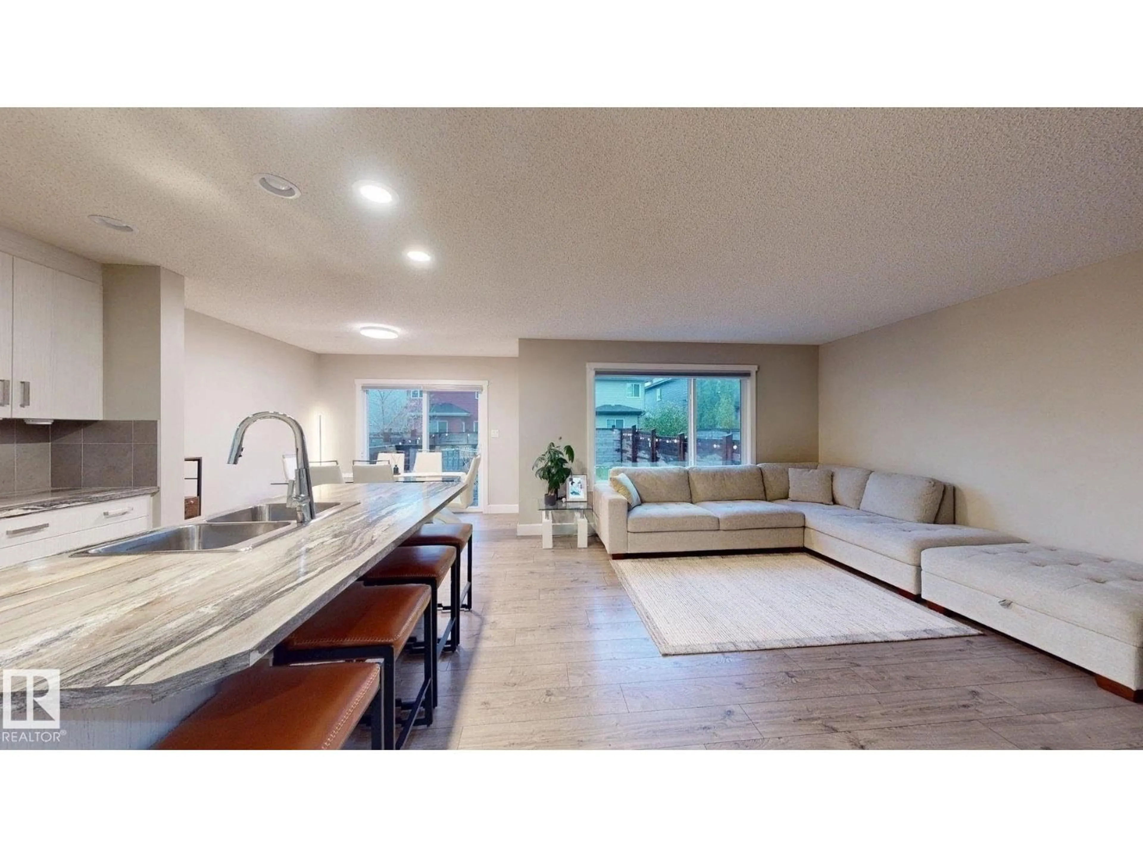 Open concept kitchen, ceramic/tile floor for 713 40 ST, Edmonton Alberta T6X2G4