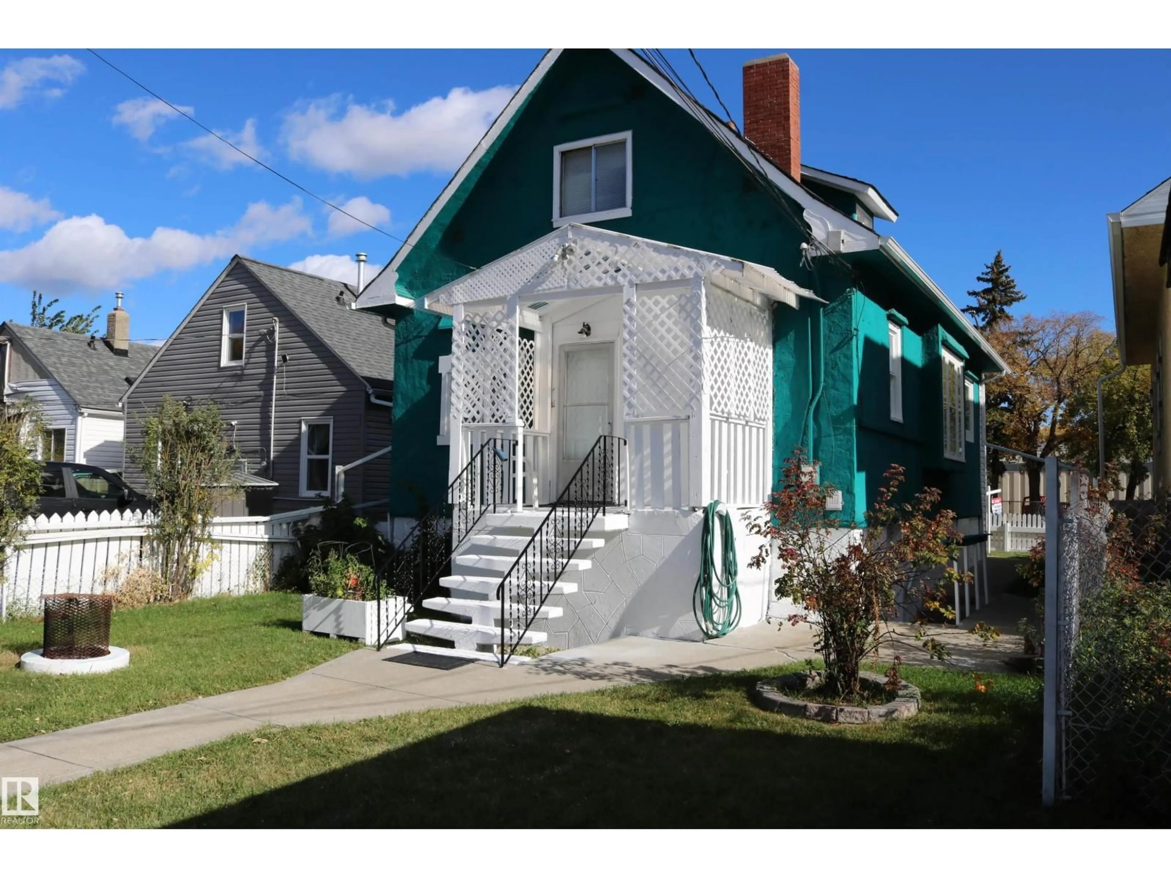 Home with vinyl exterior material, street for NW - 11624 82 ST, Edmonton Alberta T5B1P8