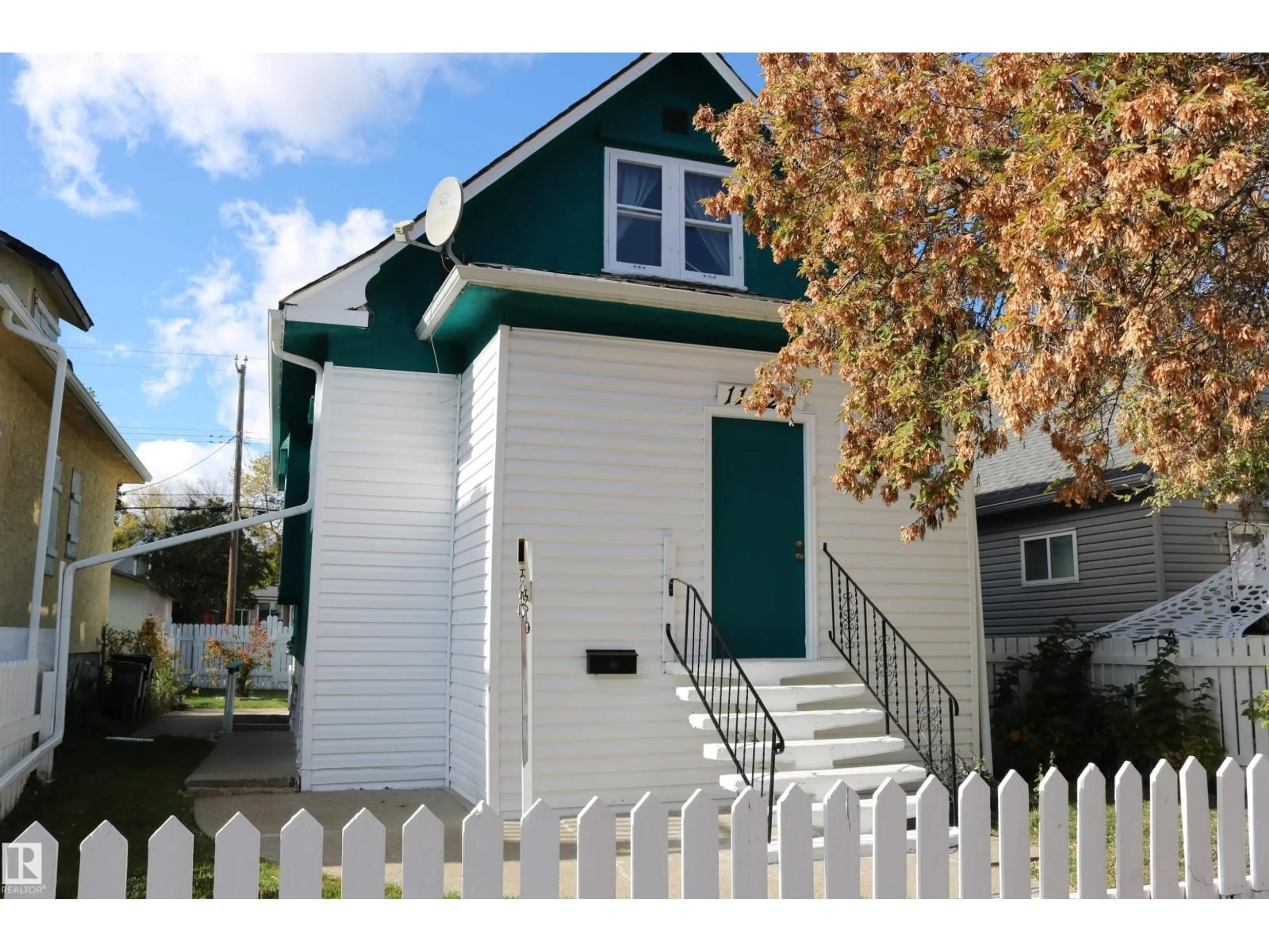 Home with vinyl exterior material, street for NW - 11624 82 ST, Edmonton Alberta T5B1P8