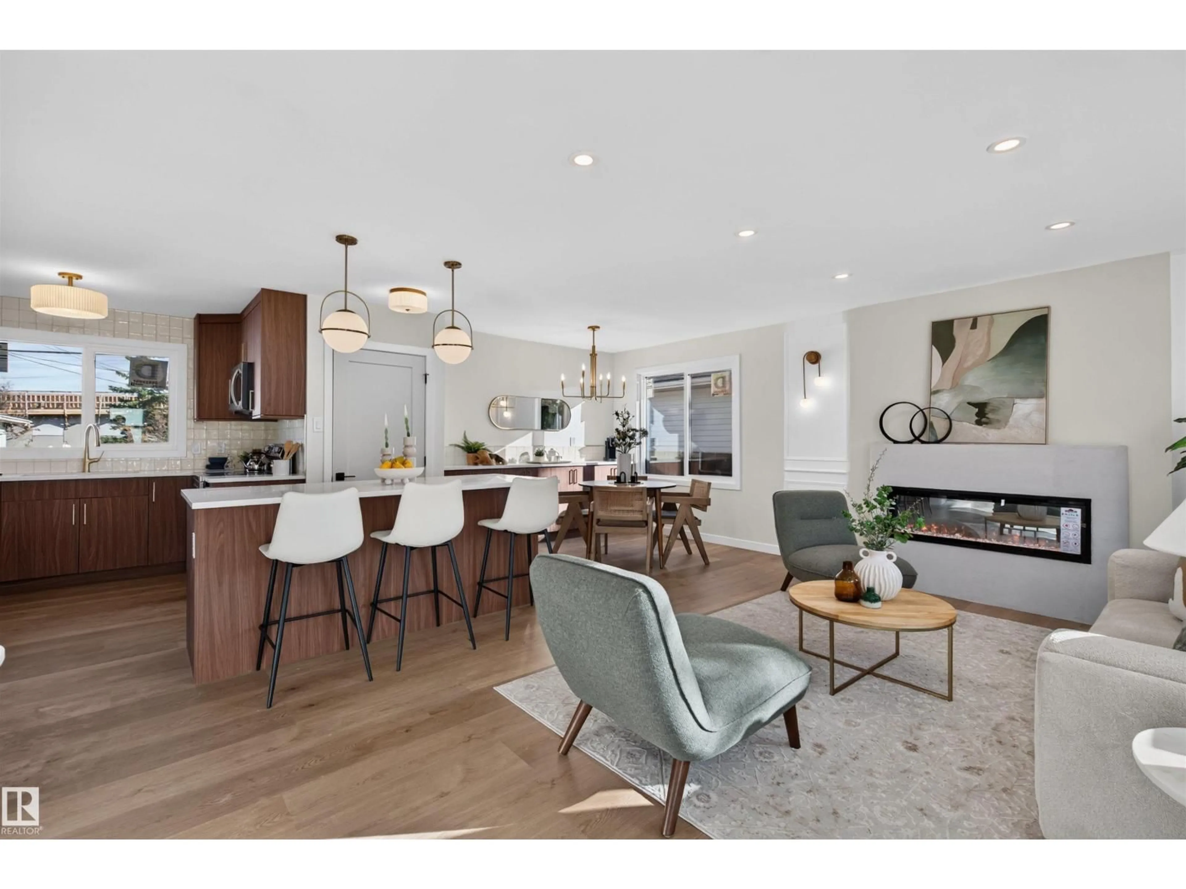 Open concept kitchen, wood/laminate floor for 8507 52 ST, Edmonton Alberta T6B1E8