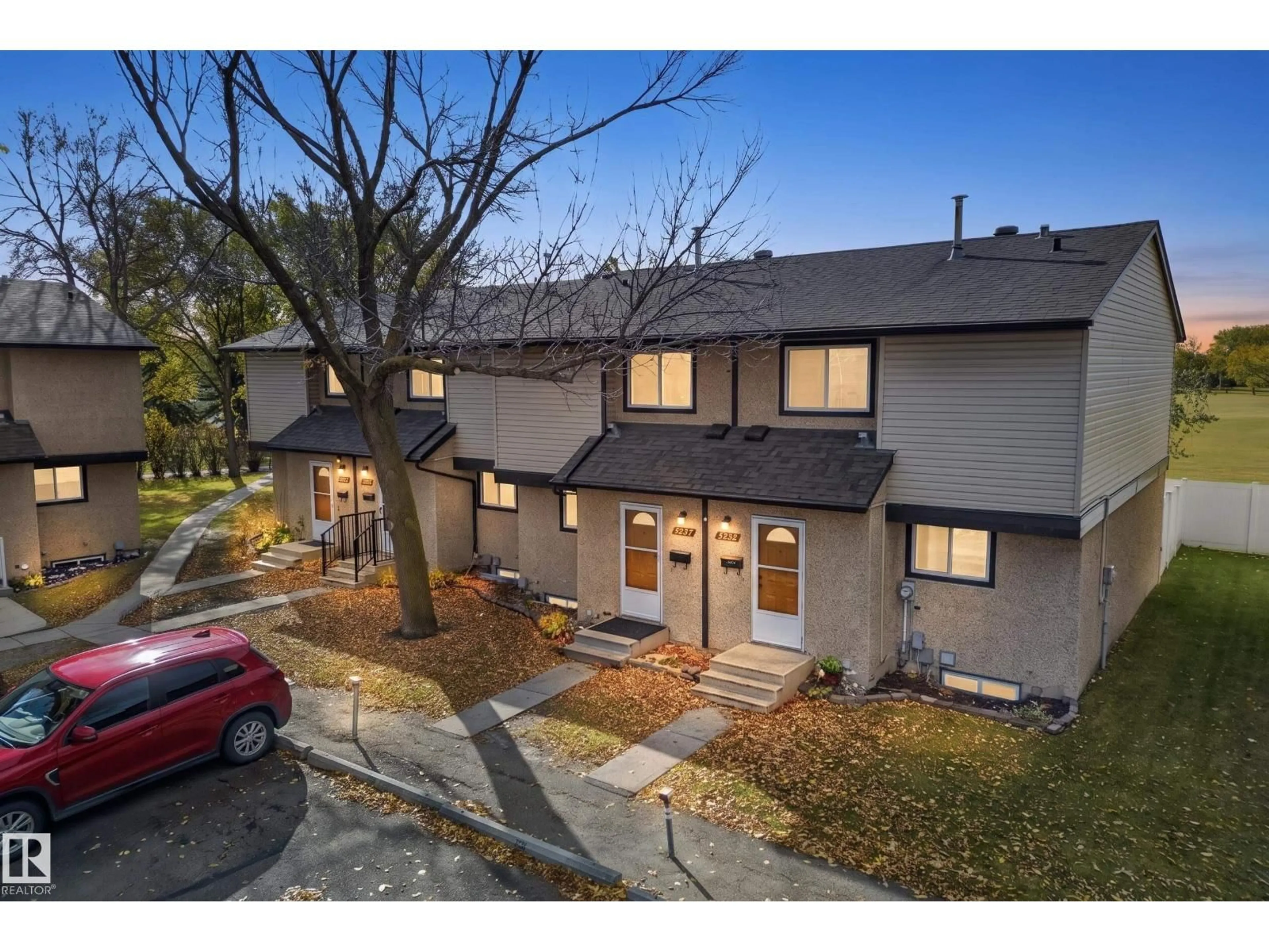 A pic from outside/outdoor area/front of a property/back of a property/a pic from drone, street for 3257 142 AV, Edmonton Alberta T5Y1H9