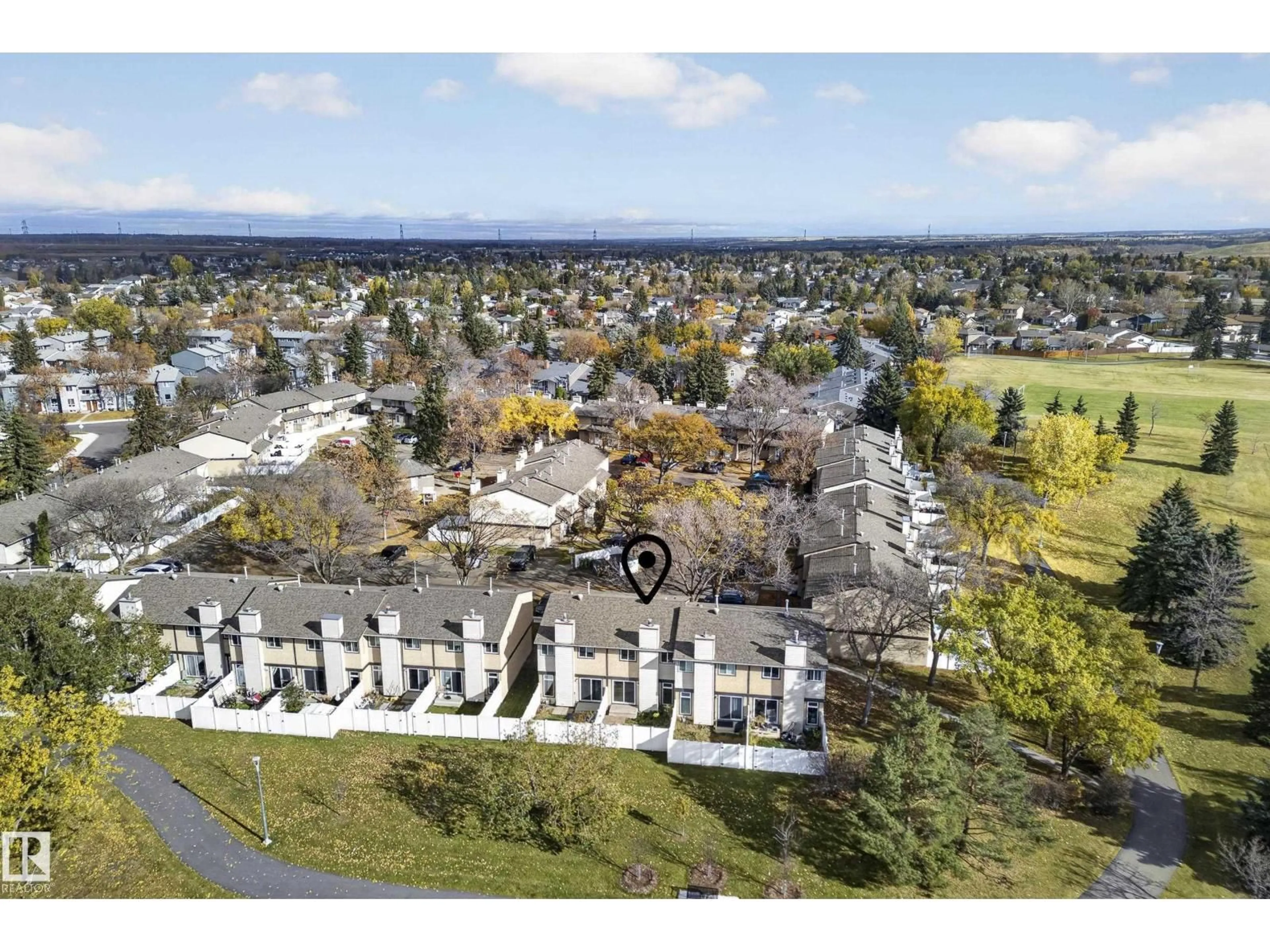 A pic from outside/outdoor area/front of a property/back of a property/a pic from drone, street for 3257 142 AV, Edmonton Alberta T5Y1H9