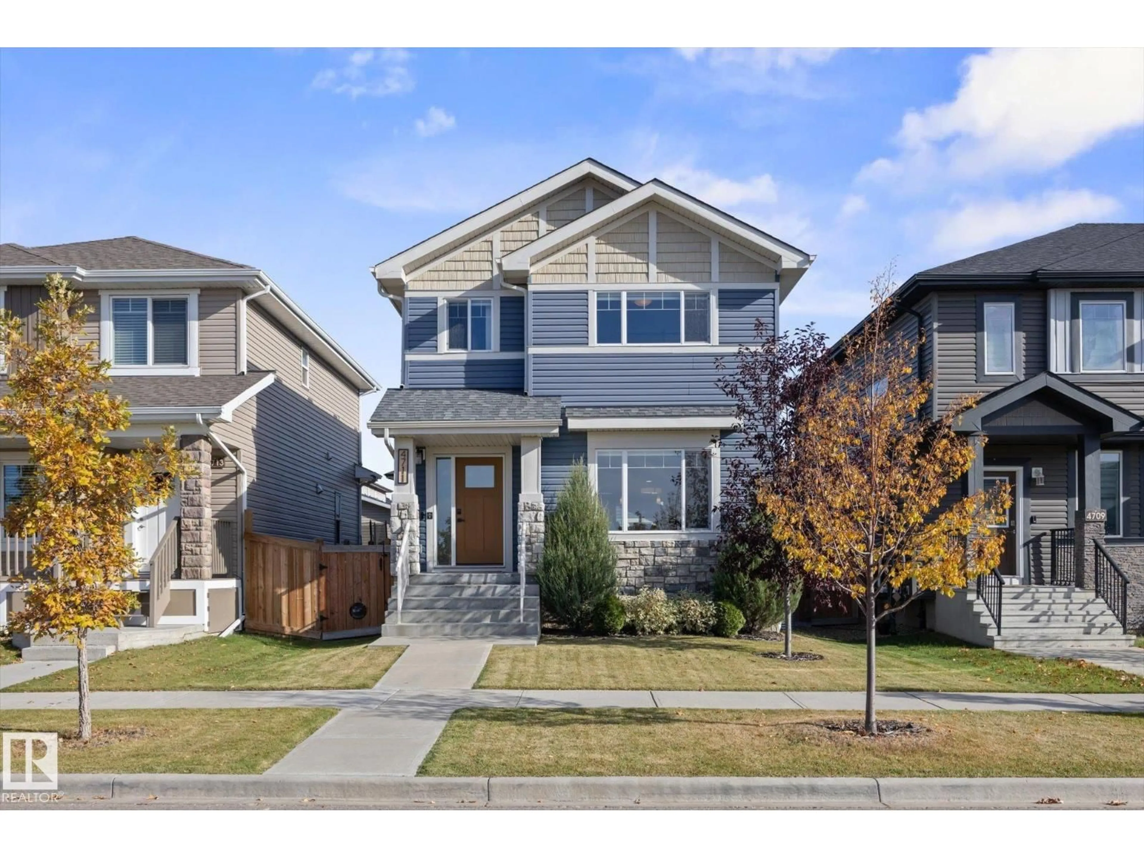 Home with vinyl exterior material, street for 4711 36 ST, Beaumont Alberta T4X2C3