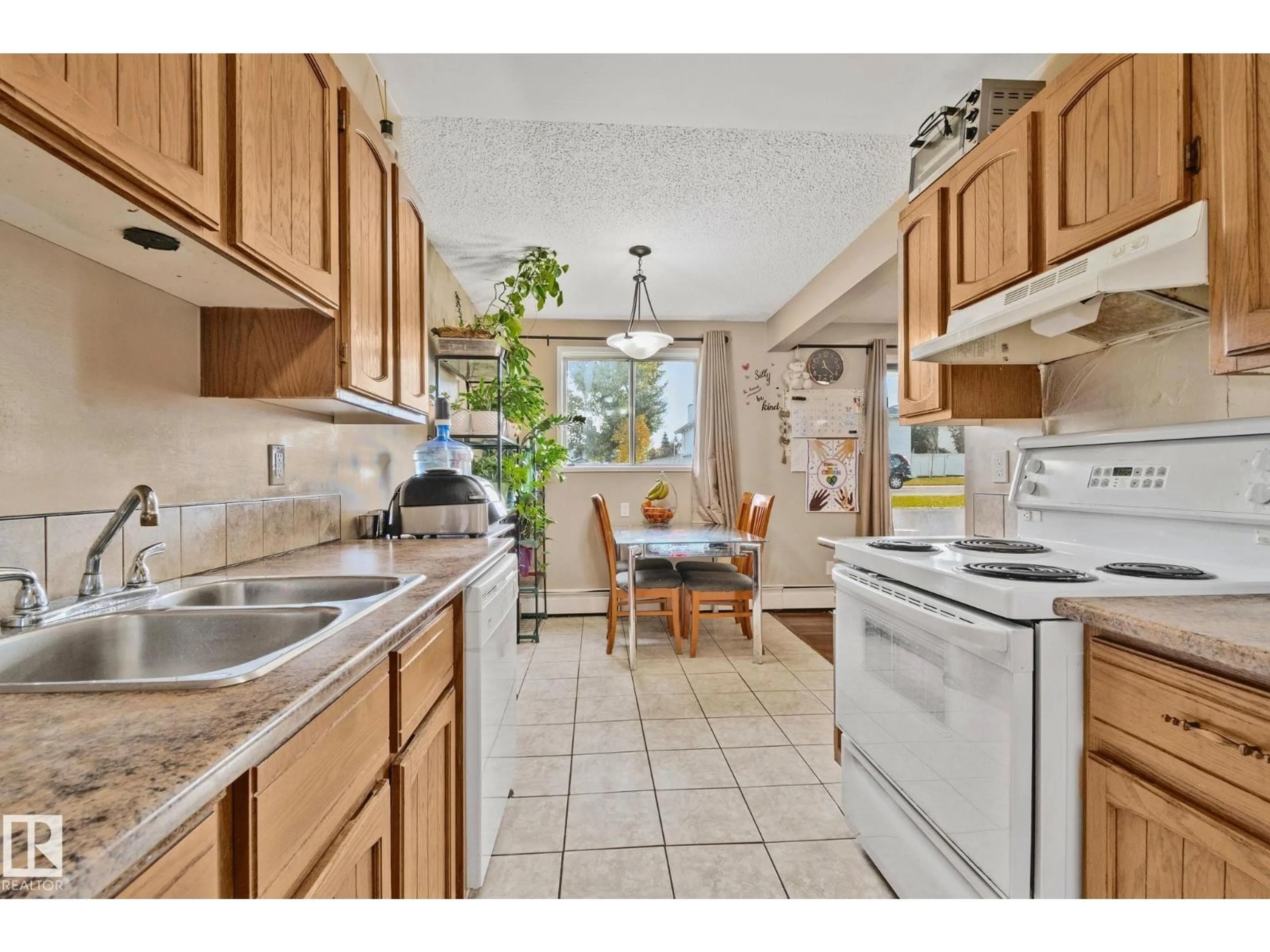 Standard kitchen, ceramic/tile floor for #116 - 3610 43 AV NW, Edmonton Alberta T6L5T2