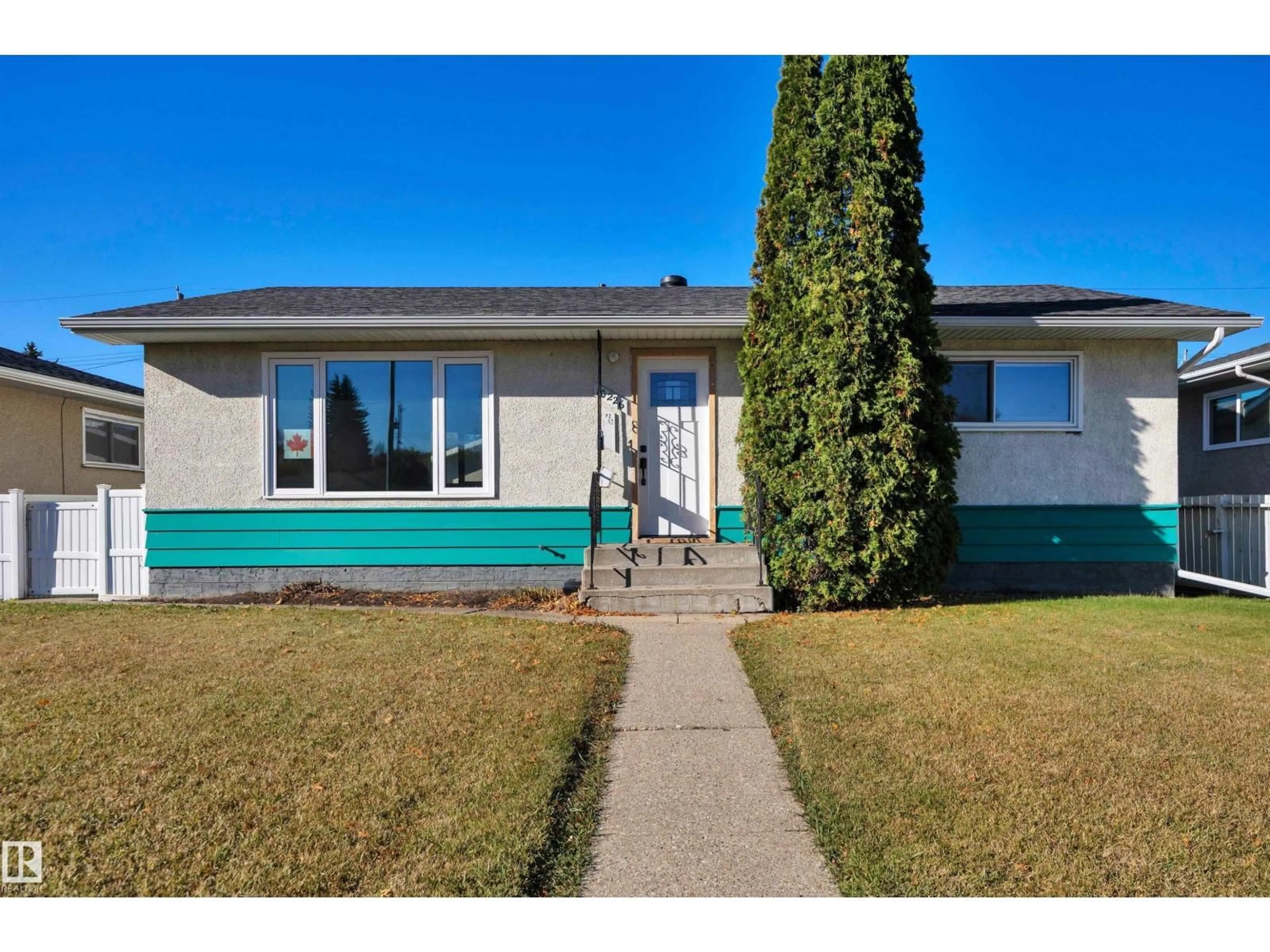 Home with vinyl exterior material, street for 10226 72 ST, Edmonton Alberta T6A2W5