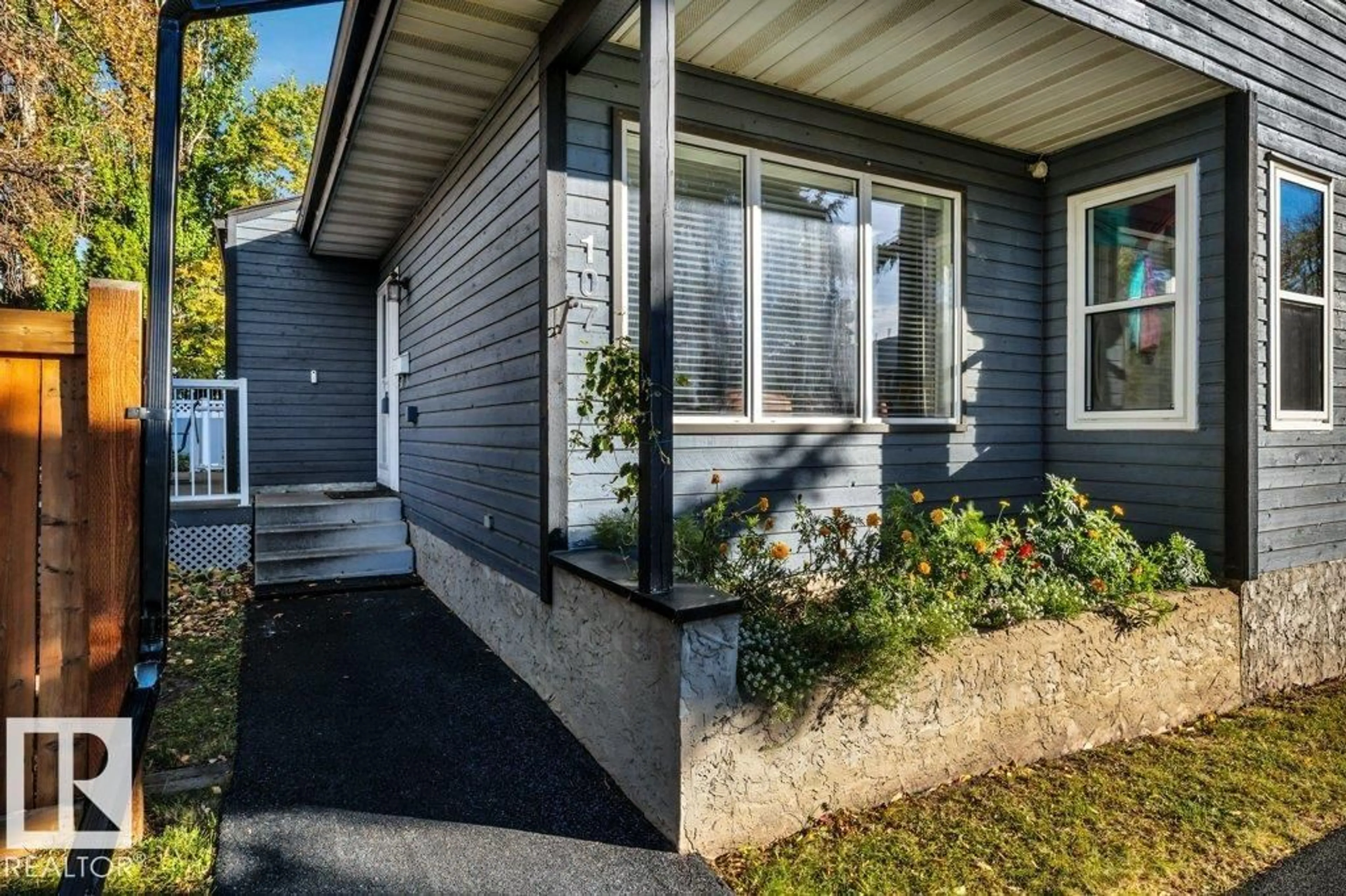 Home with vinyl exterior material, street for 107 GARDEN RD, St. Albert Alberta T8N6H7