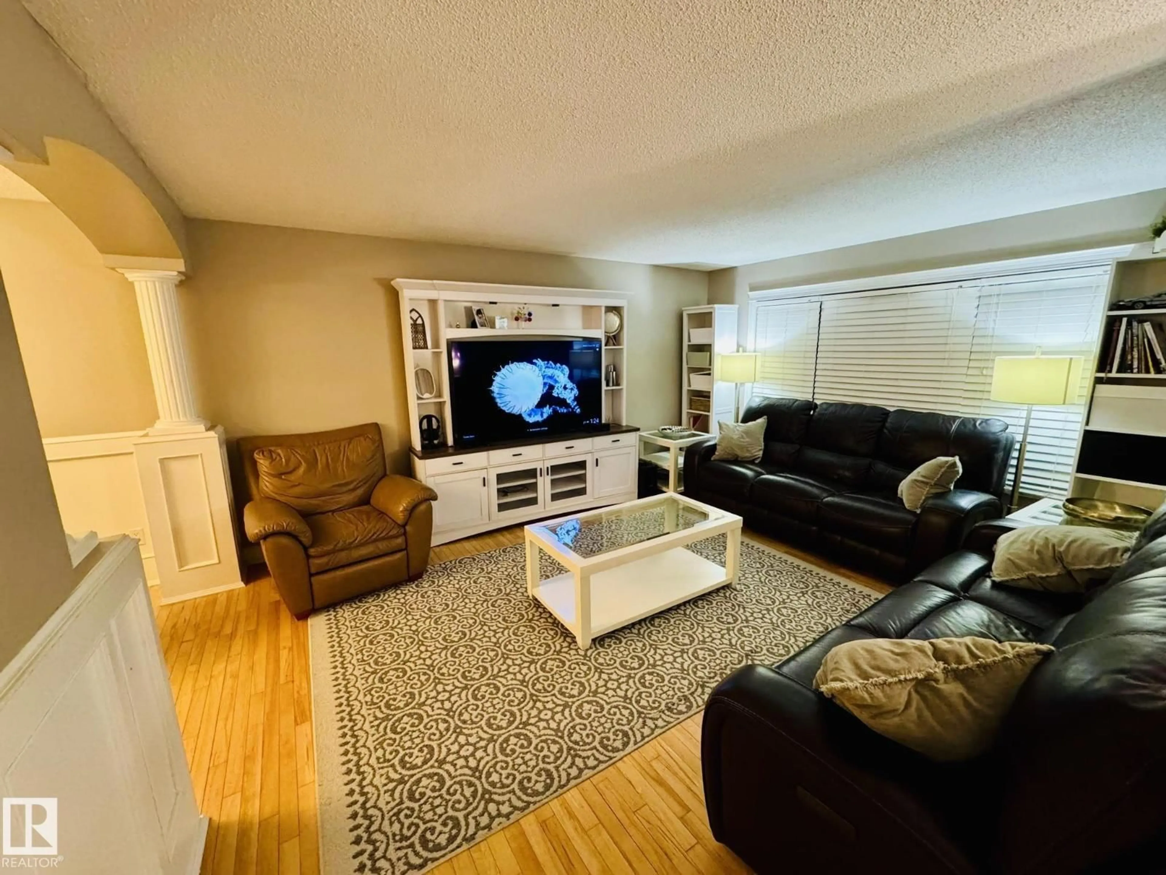 Living room with furniture, unknown for 8416 145 AV, Edmonton Alberta T5E2J2