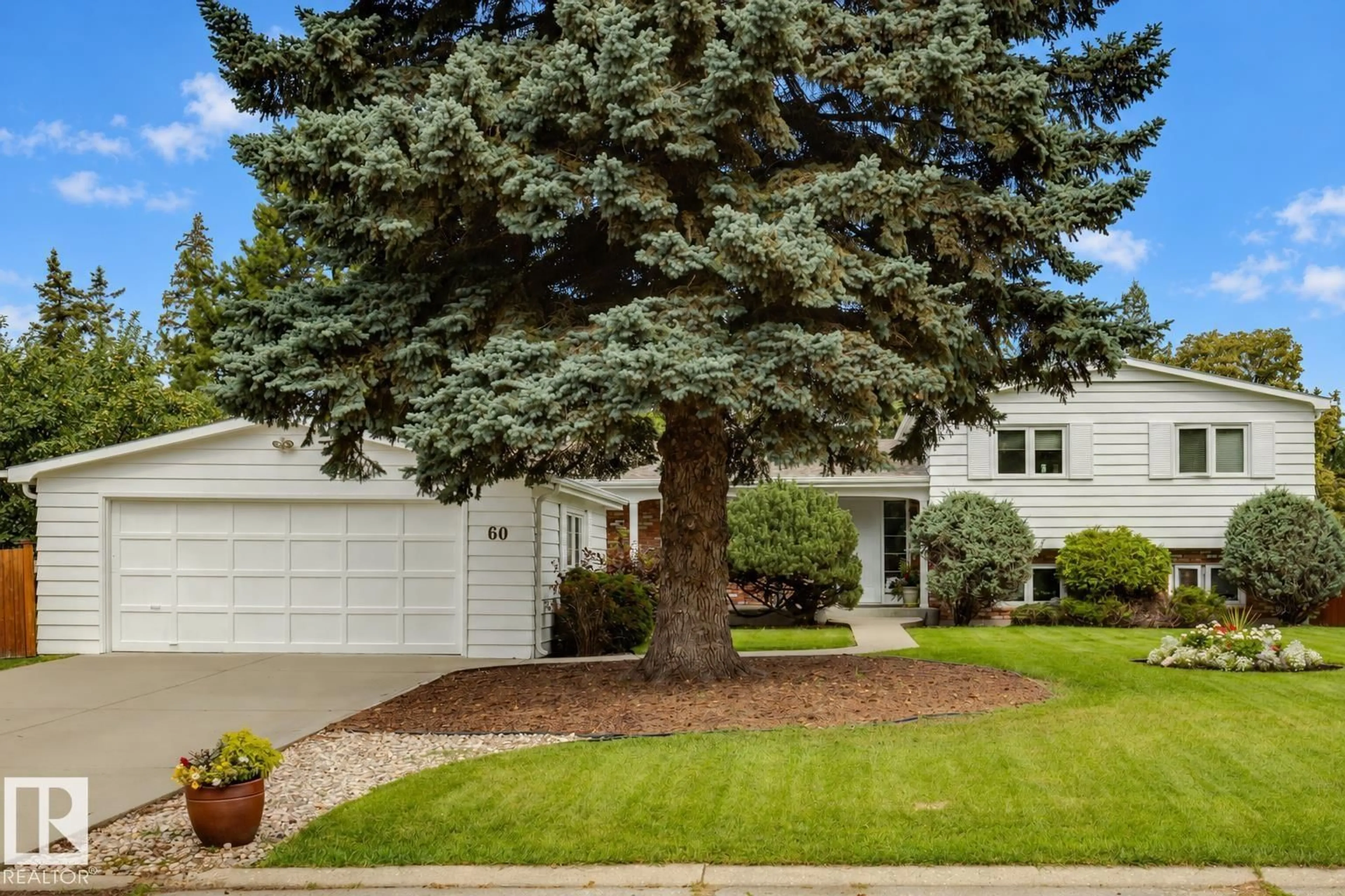 Home with vinyl exterior material, street for 60 QUESNELL CR, Edmonton Alberta T5R5N9