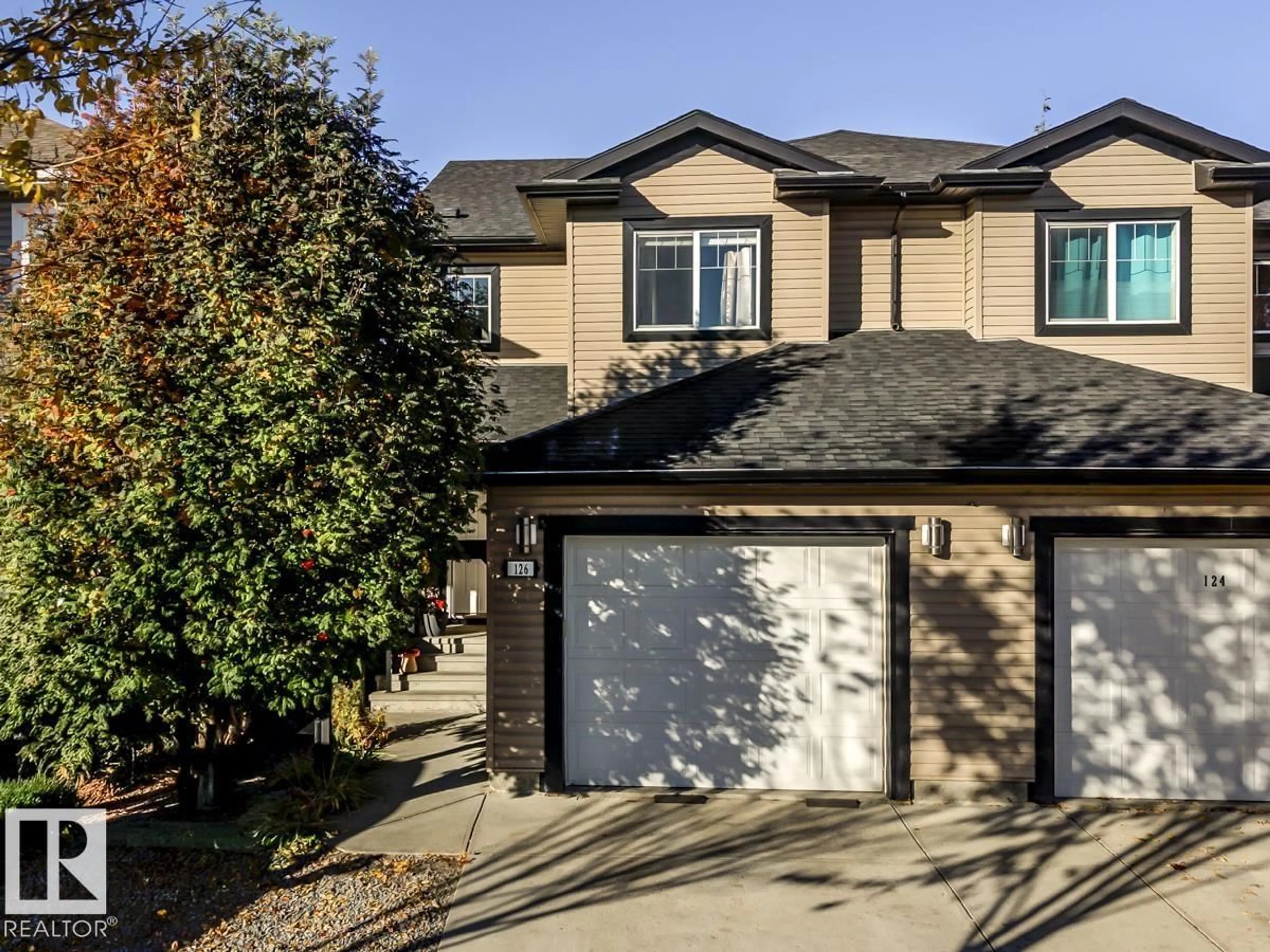 Home with vinyl exterior material, street for 126 RADCLIFFE WD, Fort Saskatchewan Alberta T8L0M6
