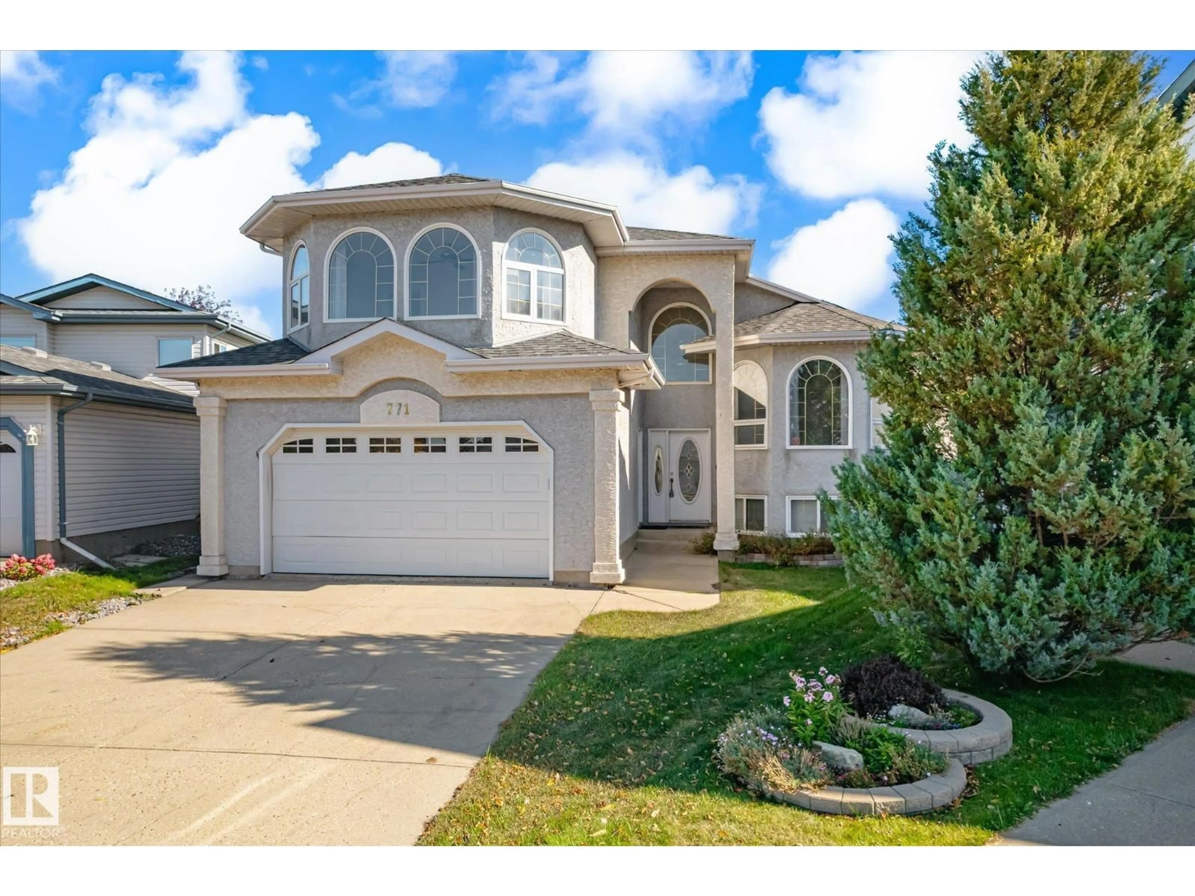 Home with vinyl exterior material, street for 771 JOHNS RD, Edmonton Alberta T6L6X4
