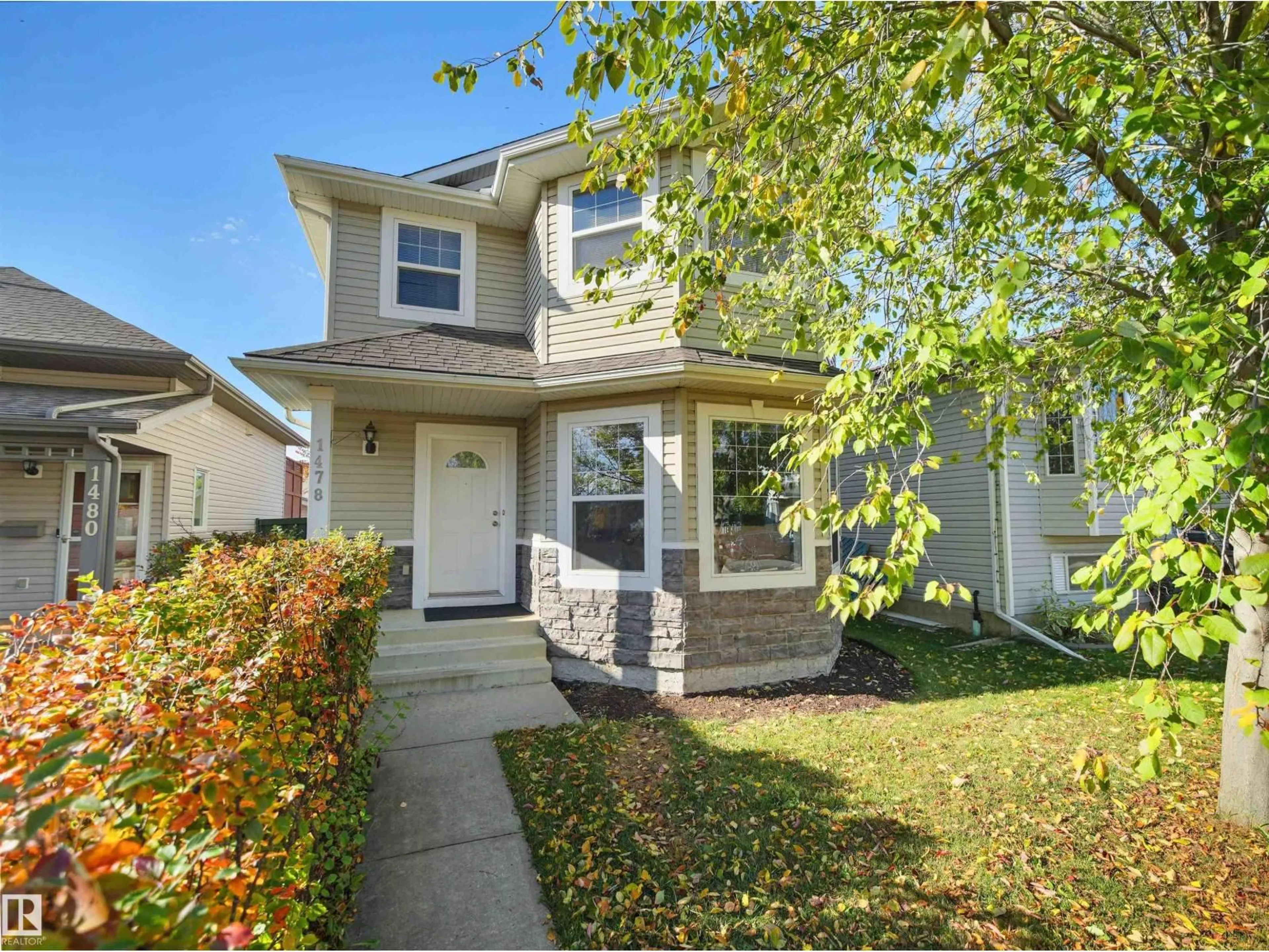 Home with vinyl exterior material, street for 1478 GRANT WY, Edmonton Alberta T5T6M9
