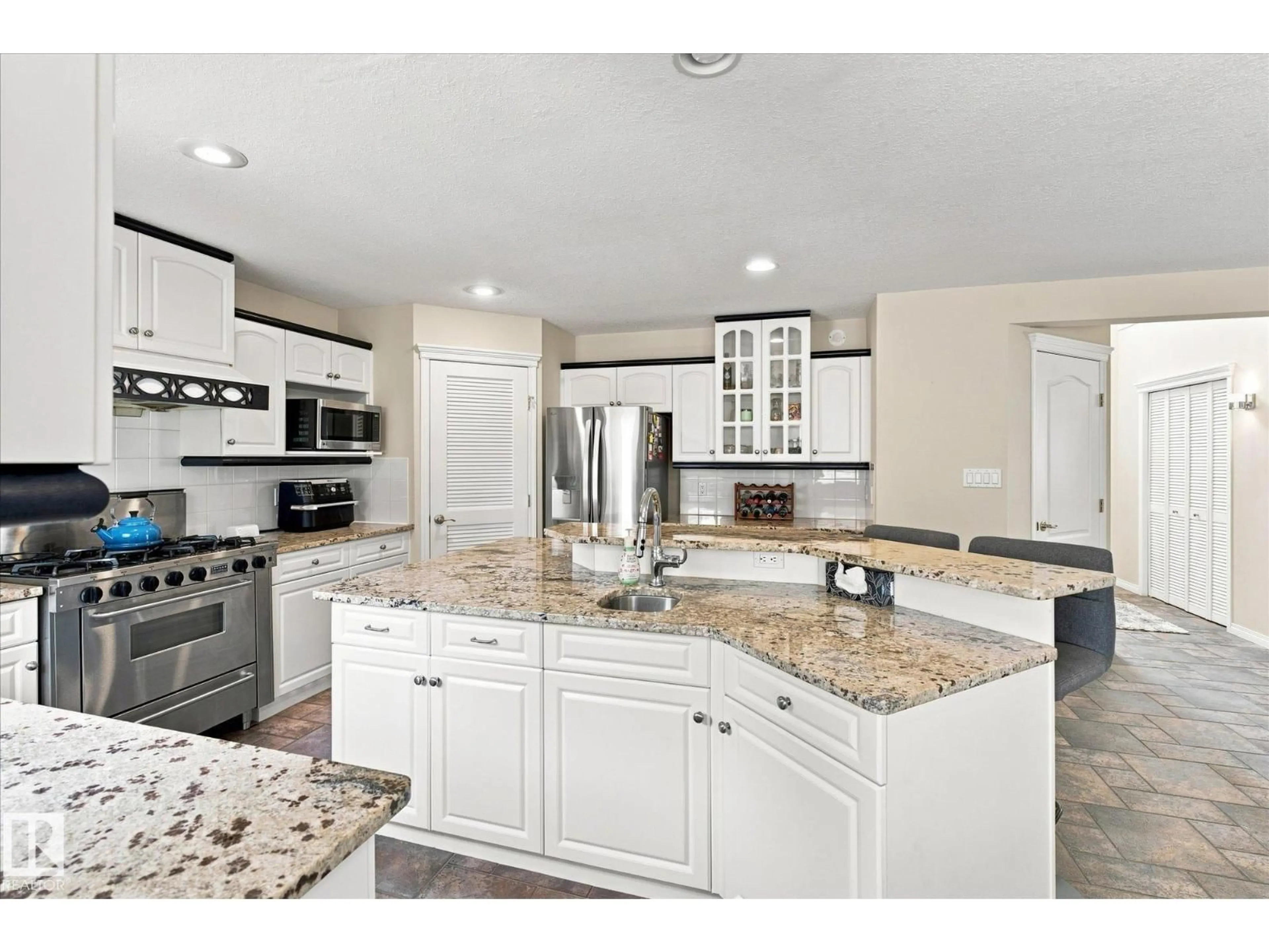 Open concept kitchen, ceramic/tile floor for NW - 1312 116 ST, Edmonton Alberta T6J7B3
