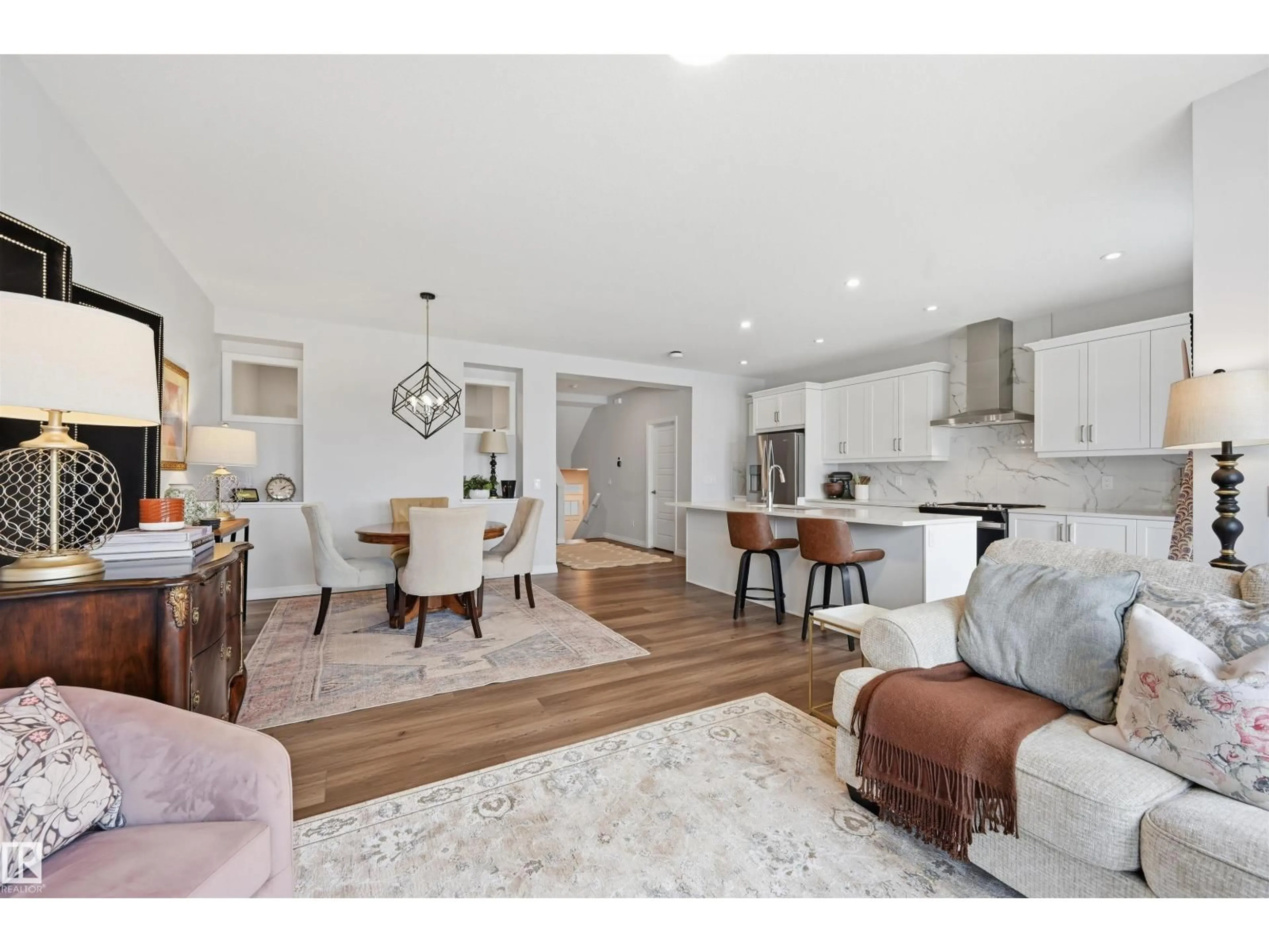 Open concept kitchen, wood/laminate floor for 2520 206 ST, Edmonton Alberta T6M1P1