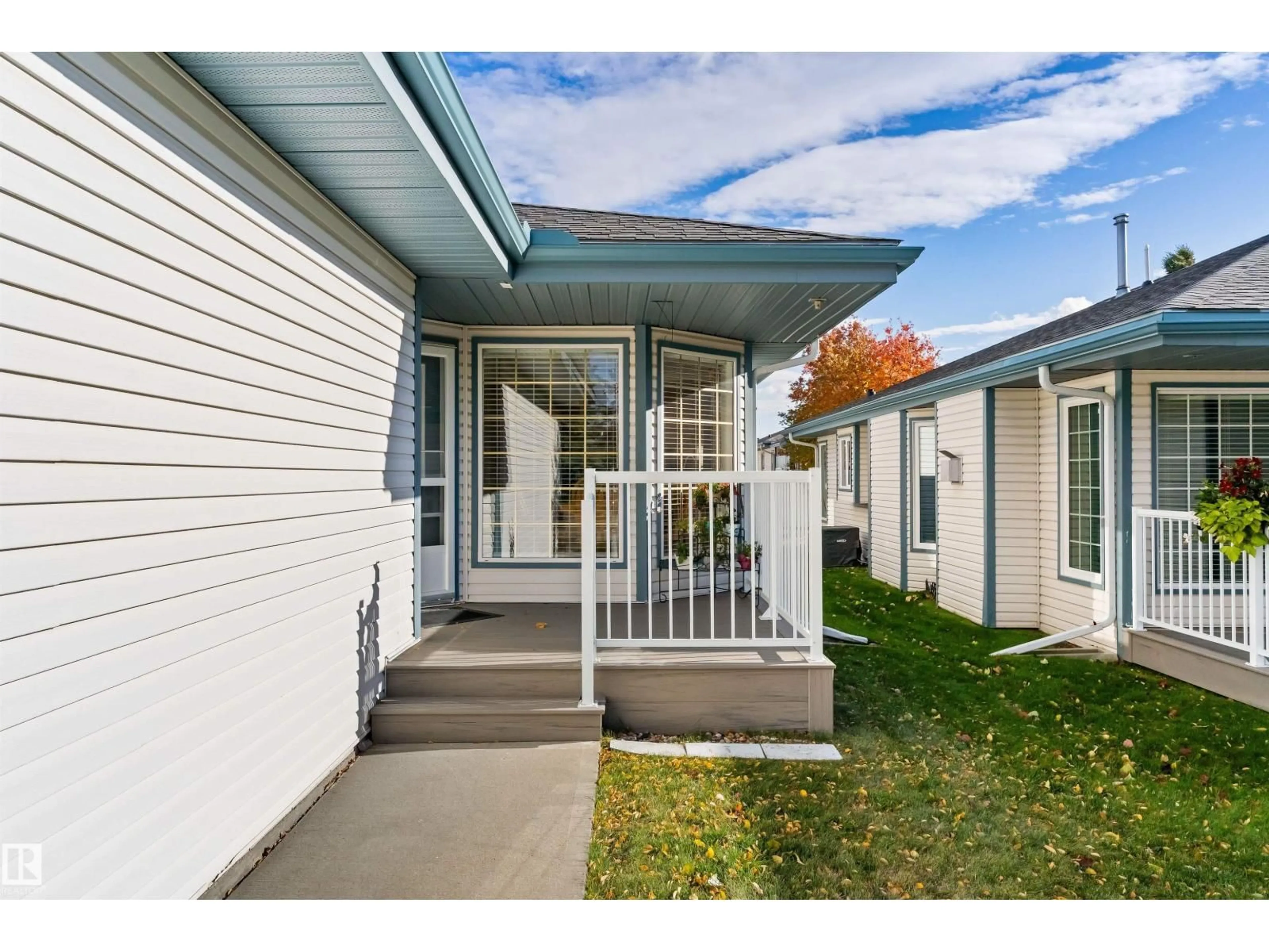 Home with vinyl exterior material, street for #5 - 17418 98A AV, Edmonton Alberta T5T6G2